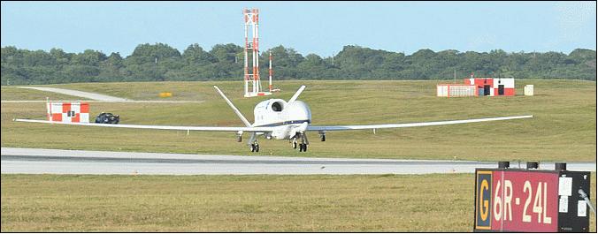 Figure 7: NASA's Global Hawk No. 872 flares for landing at Andersen Air Force Base on Guam to begin the 2014 ATTREX climate-change mission on January 17 (image credit: NASA)