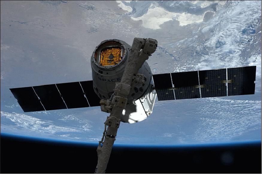 Figure 11: SpaceX Dragon resupply spacecraft grappled by Canadarm2 for berthing at the ISS on April 20, 2014 (image credit: NASA)