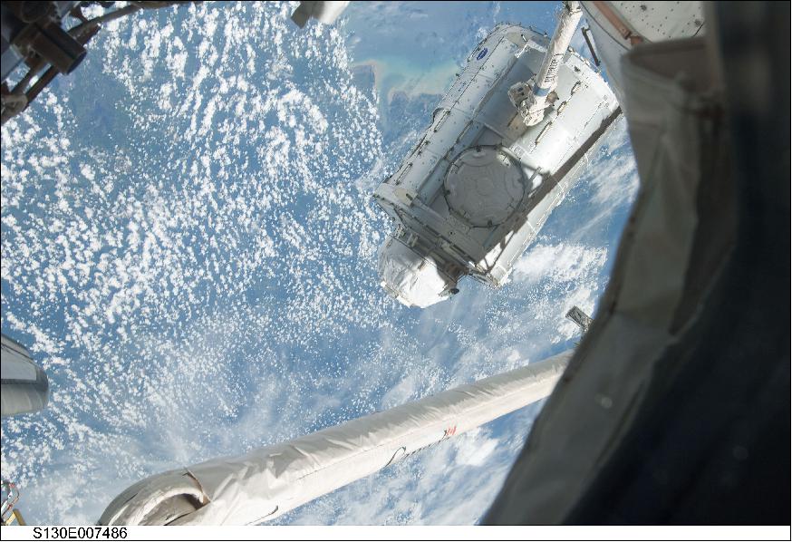 Figure 19: Photo of the Tranquility Module with Cupola attached being transferred to Node 1 of the ISS (image credit: NASA)