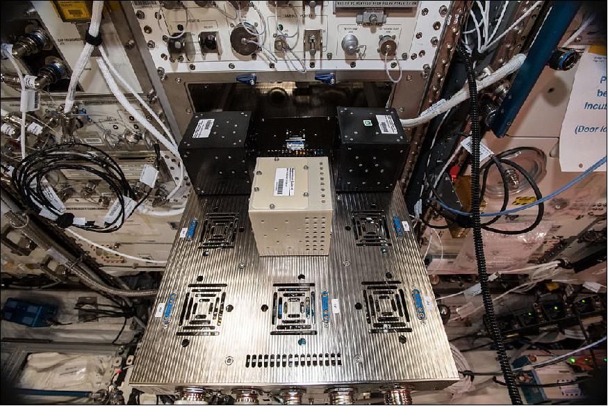 Figure 8: Framework features on the ISS: ESA astronaut Alexander Gerst installed the first experiment cubes in the facility that is housed in Europe's research laboratory Columbus, part of the ISS. The ISU team is the first customer to run experiments in ICE Cubes. The plug-and-play cubes need only to be slotted into the facility and the data collection can begin (image credit: Space Applications Services)