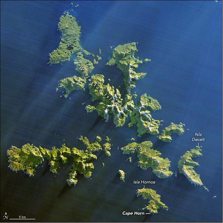 Figure 3: On July 12, 2014, OLI on Landsat-8 captured this image of Cape Horn and the Wollaston and Hermite Islands. The Sun's low position in the sky—the image was captured in mid-winter at 56 degrees South—caused the peaks on the islands to cast long shadows toward the southwest (image credit: NASA Earth Observatory, image by Jesse Allen, using Landsat data from the USGS, story by Adam Voiland)