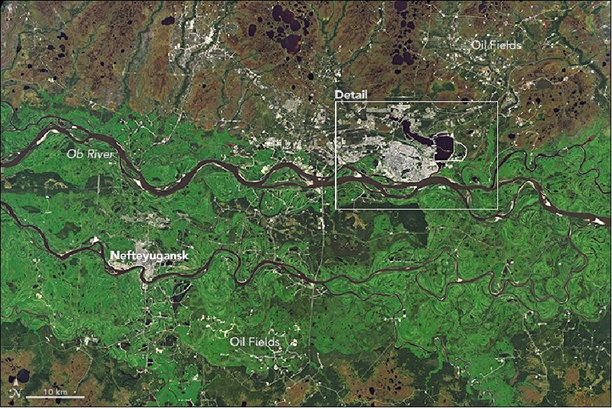 Figure 48: OLI on Landsat-8 collected this natural-color image of the city and its surroundings on August 22, 2016. Gas and oil infrastructure spreads across marshlands northeast of the city, and there is another sizable oil field southeast of the neighboring city of Nefteyugansk (image credit: NASA Earth Observatory images by Mike Taylor and Joshua Stevens, using Landsat data from the U.S. Geological Survey, story by Adam Voiland)