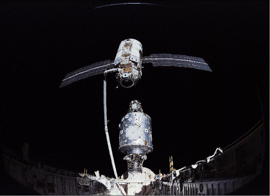 Figure 92: Endeavour, docked to Unity, moves the Zarya spacecraft into position for mating using the Canadarm (image credit: NASA)