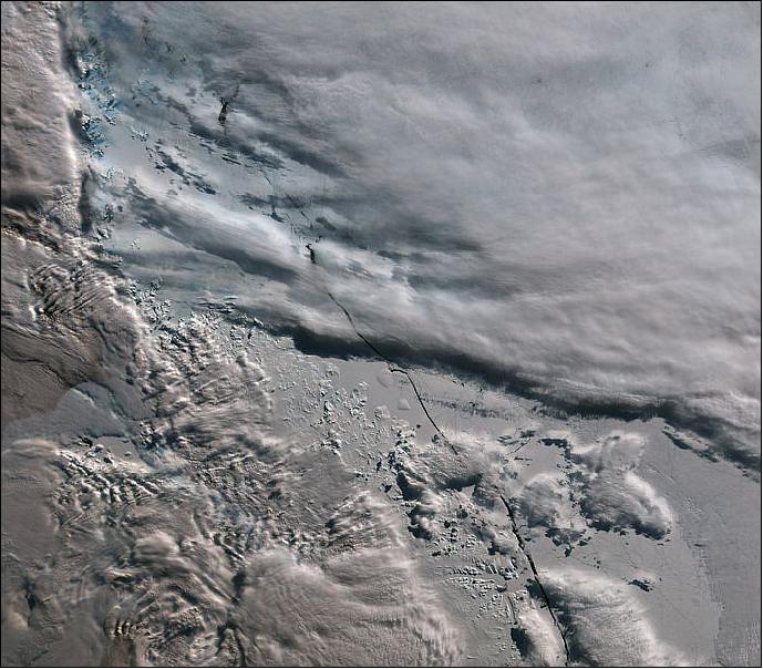 Figure 56: Another early image of SLSTR shows a long crack running through the ice shelf to the east of the center part of the Antarctic Peninsula. The crack is about 2 km wide, but widens to 4 km or more in some places. There are also finer cracks and structures visible in the ice shelf. Structure in the cloud, cloud shadows and details of the land emerging from the ice can also be seen. The image was acquired on 3 March 2016 at 11:53 GMT with the instrument's visible channel (image credit: Copernicus data (2016)