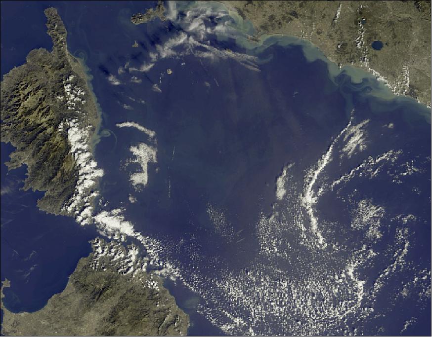 Figure 48: Zoom in image from Figure 47. The islands of Corsica and Sardinia can be seen in the west with coast of Tuscany and the island of Elba to the northeast. The waters along the east coast of Corsica and along the Italian coast are colored by discharge from the land following recent heavy rainfall (image credit: ESA, the image contains modified Copernicus Sentinel data (2016) processed by EUMETSAT) 49)