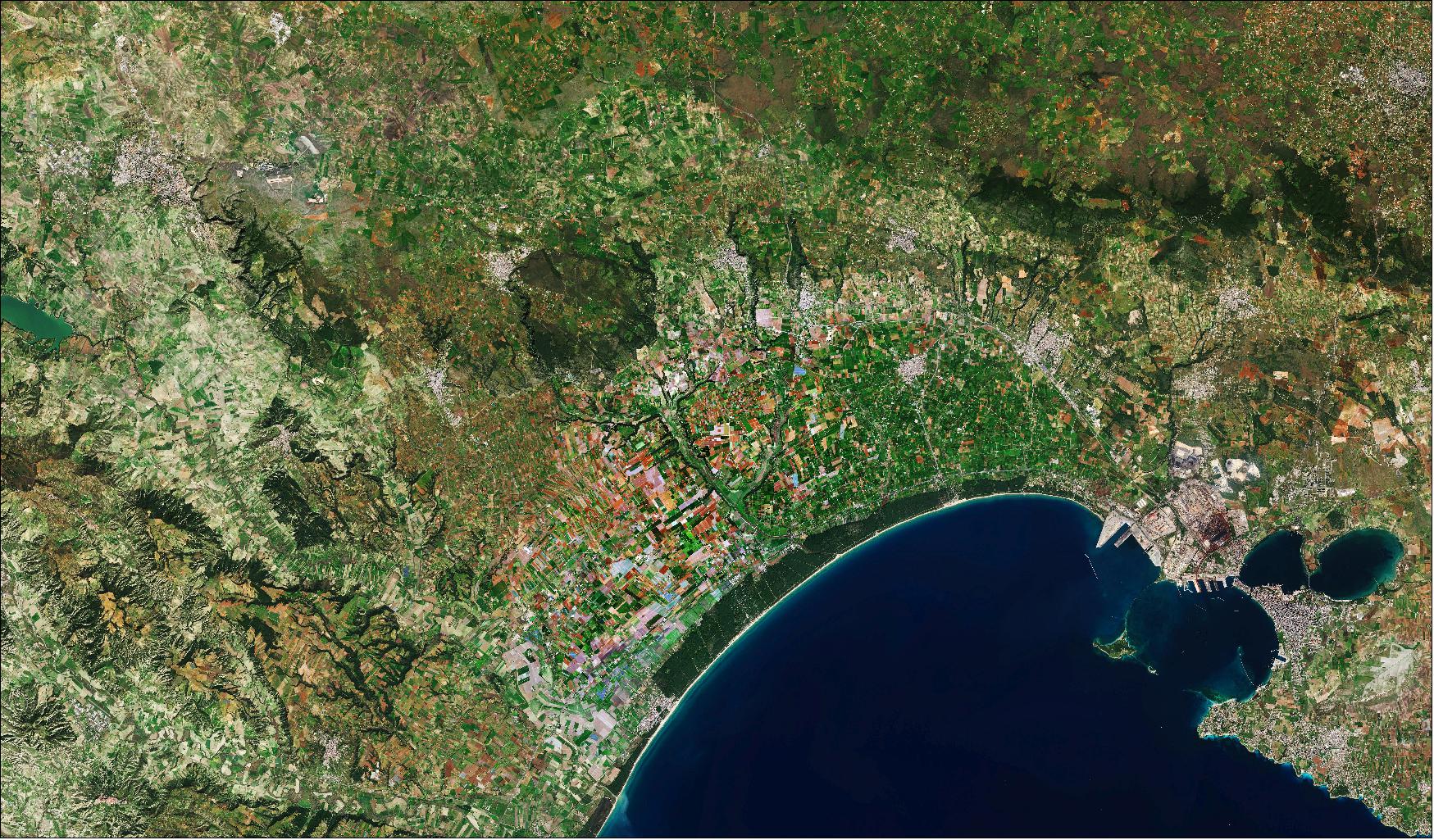 Figure 24: Taranto, an important coastal city, is visible on the bottom right of the image. Founded by a Greek colony in the 8th century, the city is now an important commercial port. The islets of San Pietro and San Paolo, known as the Cheradi Islands, protect the Mar Grande, the main commercial port of the city. It is separated from the Mar Piccolo, an inland lagoon, by a cape which closes the gulf. The industrial district, which is visible northwest of the city, has a high number of factories, oil refineries, steelworks and iron foundries. This image, captured on 6 March 2019, is also featured on the Earth from Space video program (image credit: ESA, the image contains modified Copernicus Sentinel data (2019), processed by ESA, CC BY-SA 3.0 IGO)