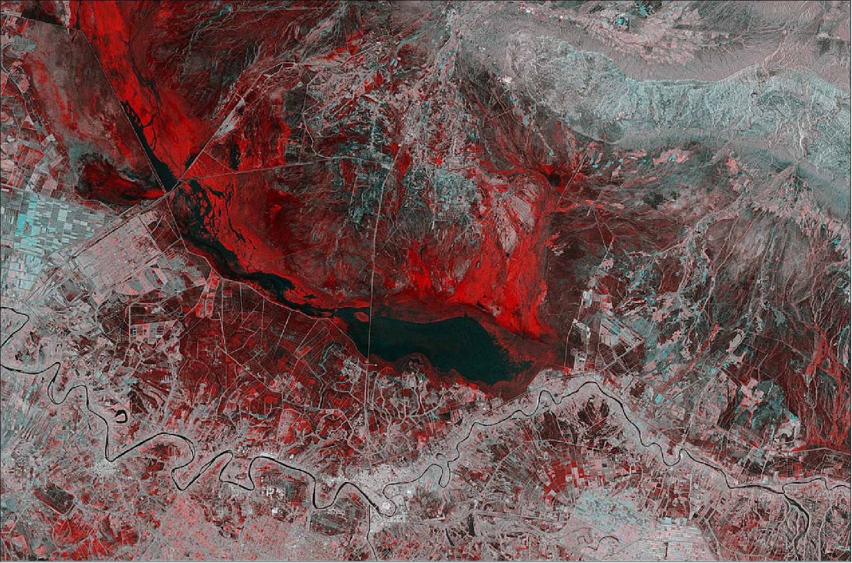 Figure 35: This Copernicus Sentinel-1 image combines two acquisitions over the same area of eastern Iraq, one from 14 November 2018 before heavy rains fell and one from 26 November 2018 after the storms. The image reveals the extent of flash flooding in red, near the town of Kut. This image is also featured on the Earth from Space video program (image credit: ESA, the image contains modified Copernicus Sentinel data (2018), processed by ESA, CC BY-SA 3.0 IGO)