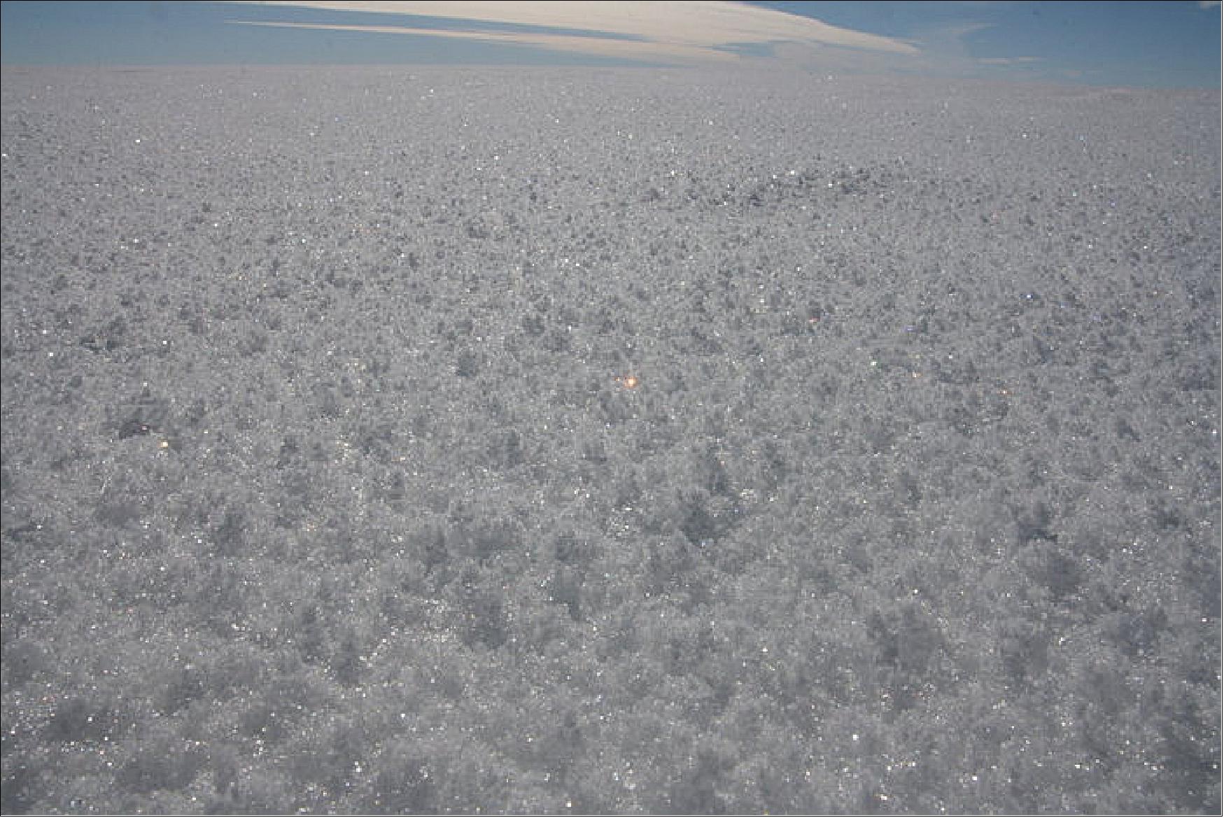 Figure 16: Grainy nature of snow. Most of us probably wouldn’t think of describing snow in terms of its grain size. However, grain size is fundamental to the amount of sunlight that snow reflects back into space, its albedo (image credit: H. C. Steen Larsen)