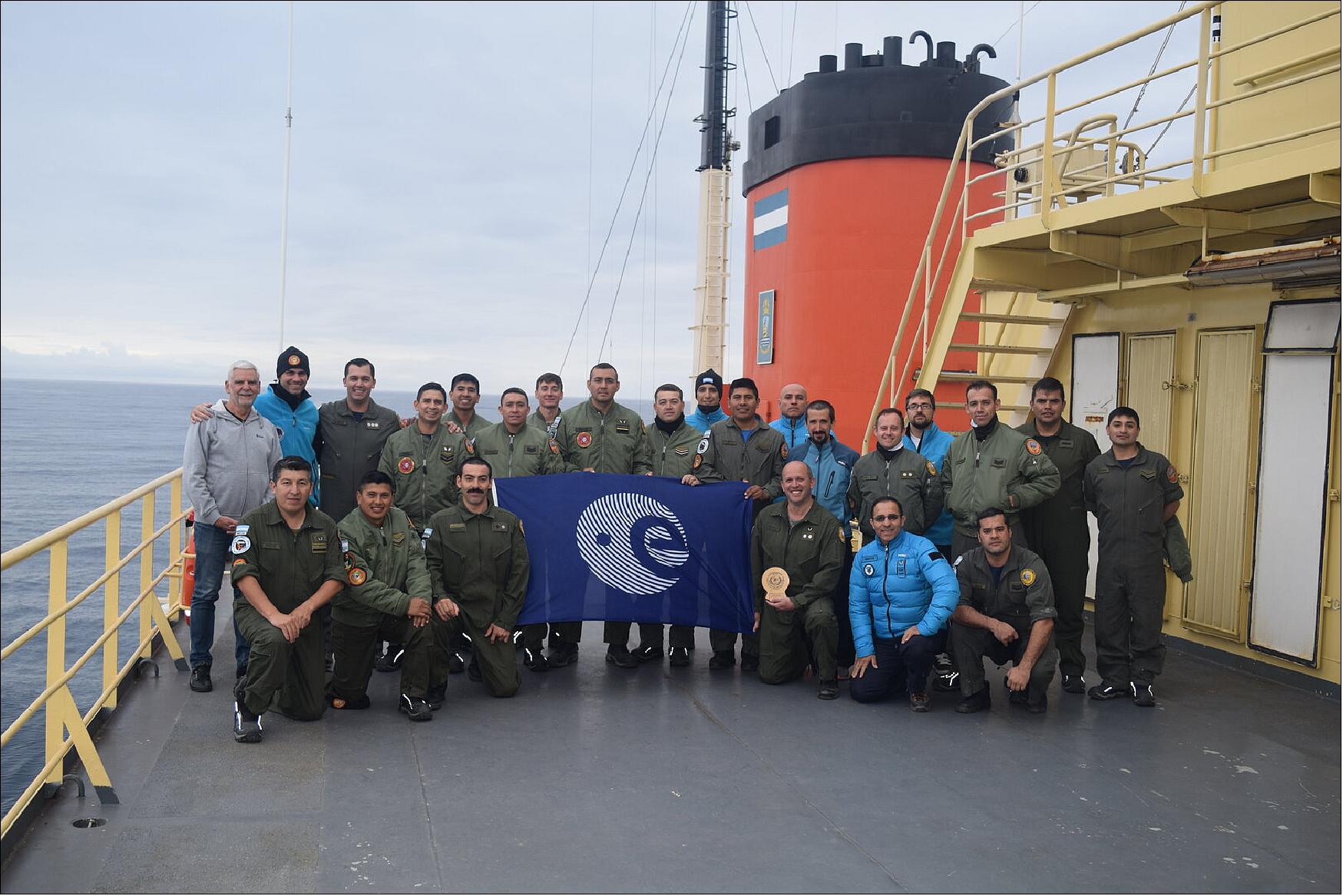 Figure 3: Belgrano base crew and Tempus team. ESA senior scientific advisor Dr Victor Demaria-Pesce, Dr Daniel Vigo from the Catholic University of Argentina and Dr Juan Manuel Cuiuli pictured with the crew of Argentinia's Belgrano II Antarctic base onboard the icebreaker vessel ARA Alte Irizar. The trio travelled to Antarctica to support the deployment and testing of two Tempus Pro telemedicine devices as ESA prepares to take its next steps into space (photo credit: ESA)