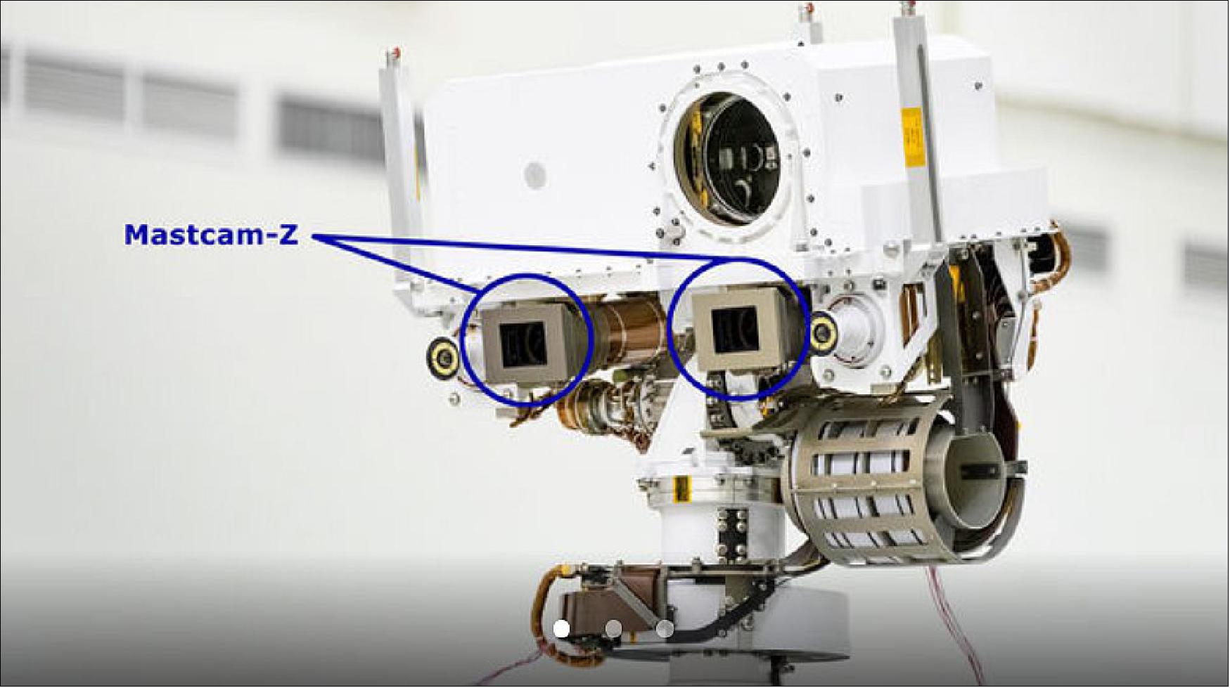 Figure 3: A close-up of the head of Perseverance Rover's remote sensing mast. The mast head contains the SuperCam instrument (its lens is in the large circular opening). In the gray boxes beneath mast head are the two Mastcam-Z imagers. On the exterior sides of those imagers are the rover's two navigation cameras (image credit: NASA/JPL-Caltech)