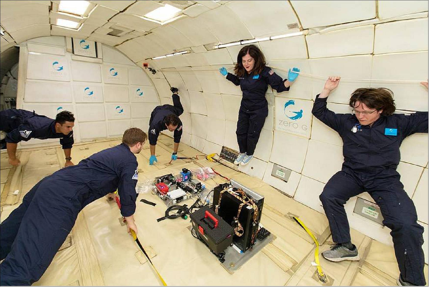 Figure 1: Marshall's ring-sheared drop team tests their payload in weightlessness on a Zero Gravity Corporation's G-Force One aircraft. Each team member is at least partially vaccinated and was tested for COVID-19 each morning before entering flight facilities (image credit: Zero-G, Steve Boxall)