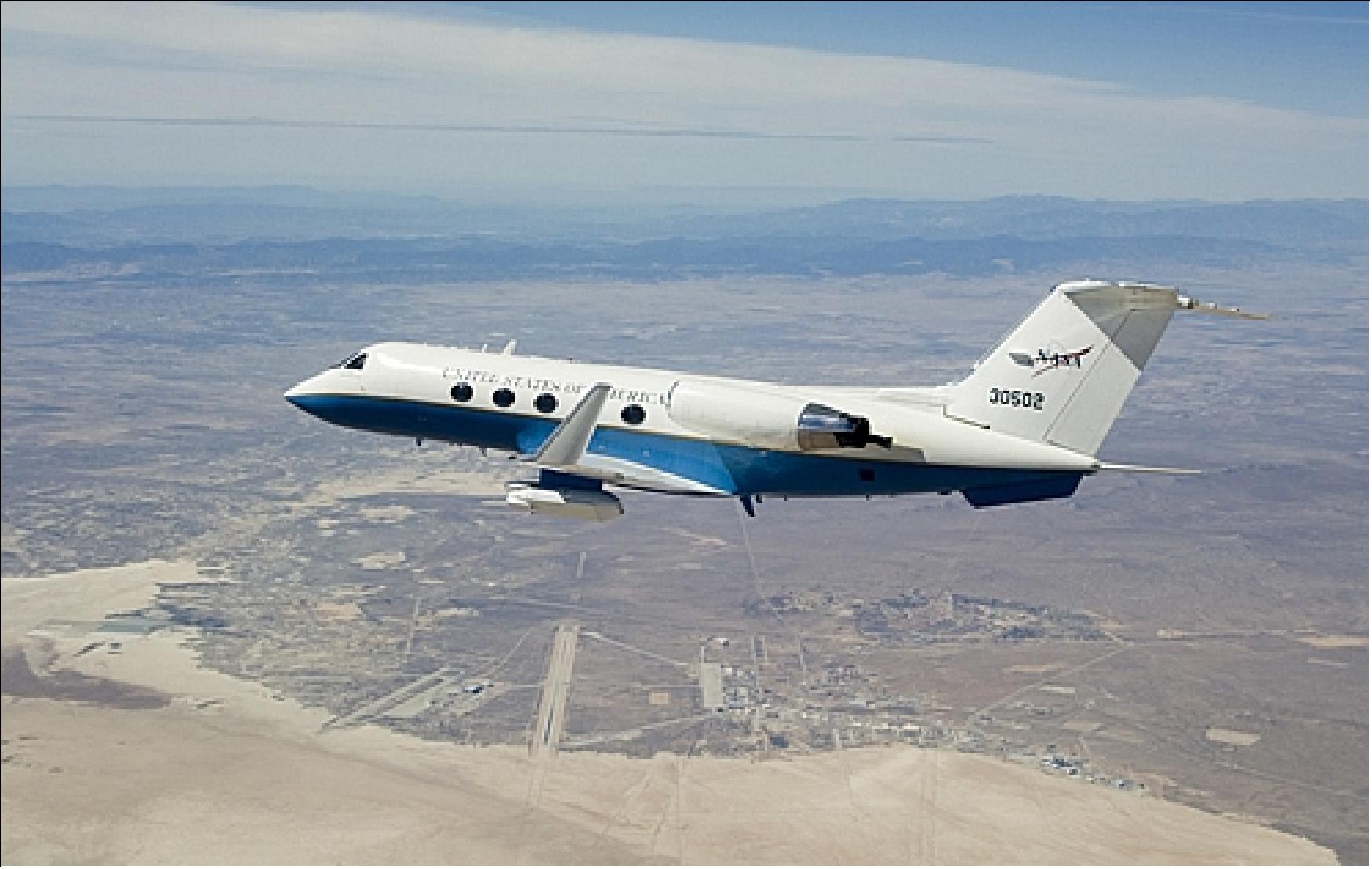 Figure 19: Modified NASA Gulfstream III in early flight tests with the UAVSAR pod attached to the underside of the aircraft (image credit: NASA/DFRC)