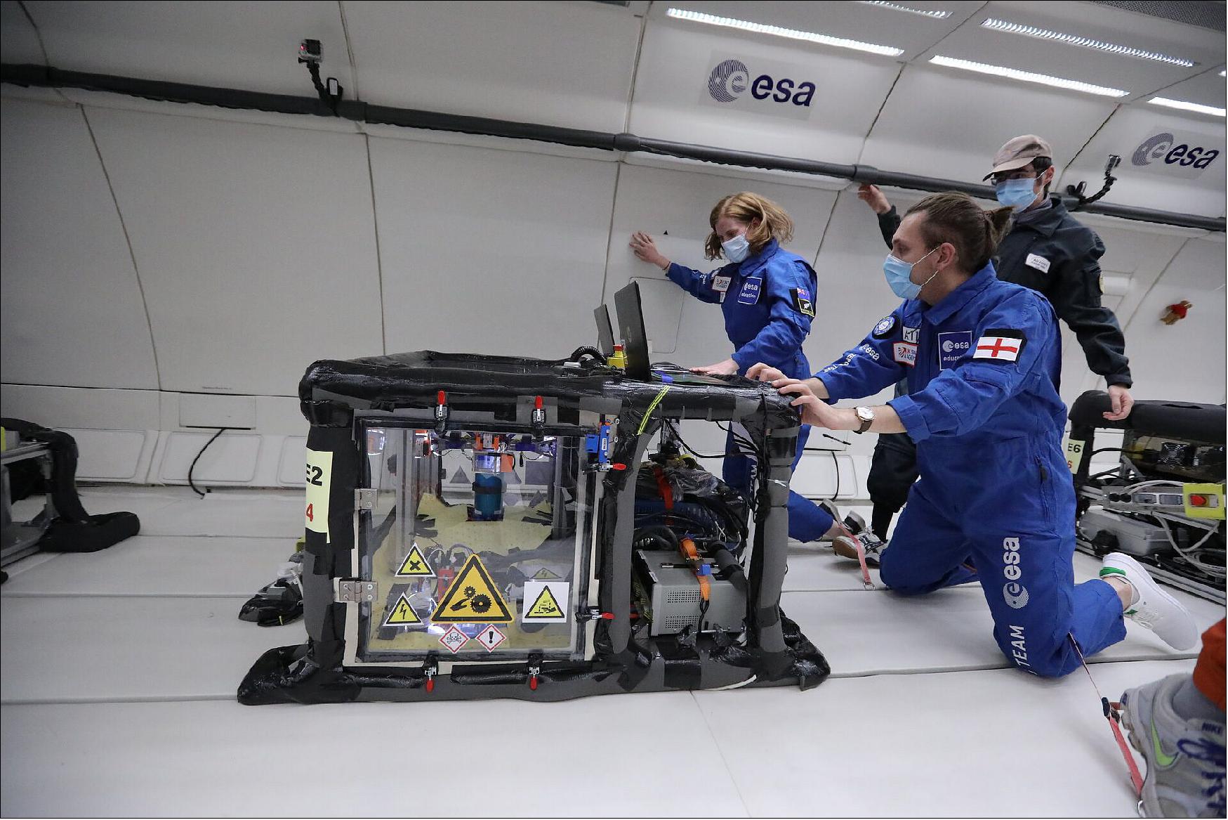 Figure 9: RELOX team in weightlessness being inspected by a Novespace engineer (image credit: Novespace)