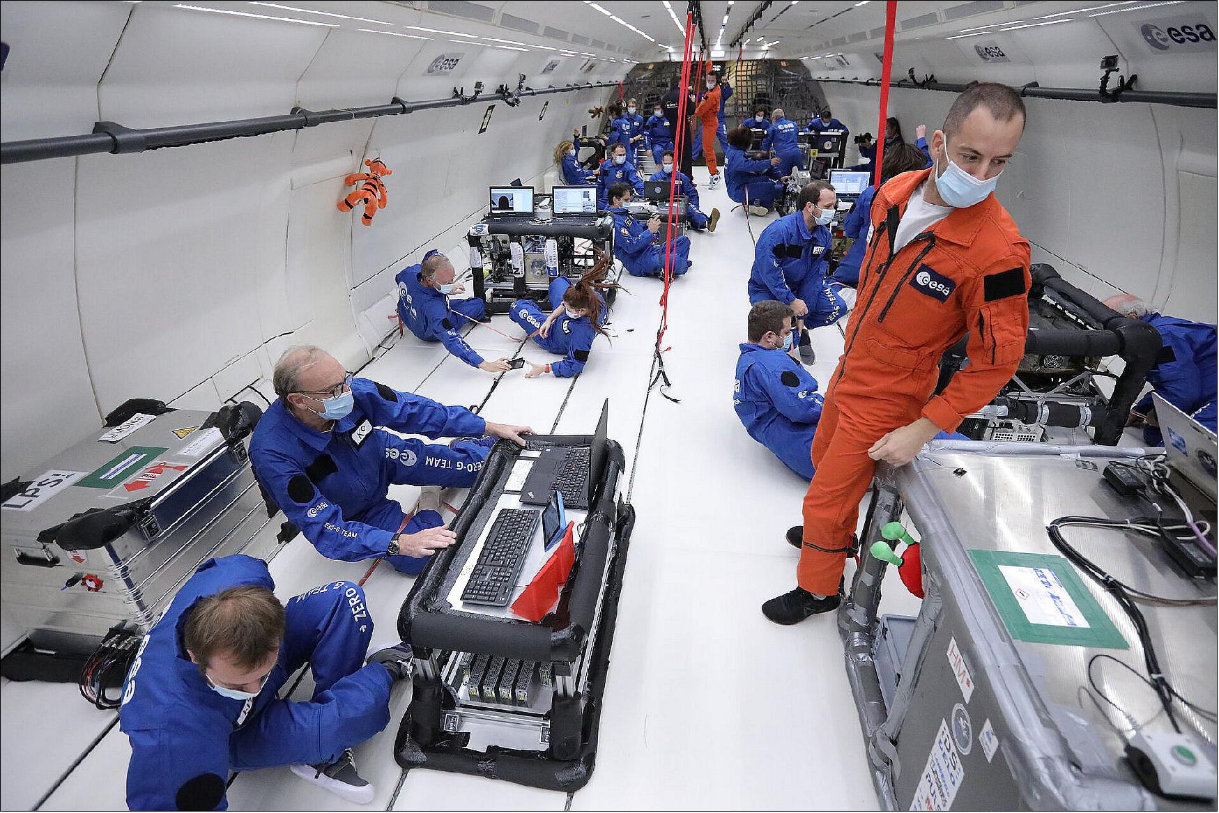 Figure 5: Inside ESA's 73rd parabolic flight. The diverse experiments focused on how humans perceive motion without gravity as reference, how our brains manage to process information during weightlessness, new ways of extracting oxygen from lunar soil, techniques for better cooling and heat transfer in space, and zero-g 3D-printing (image credit: Novespace)