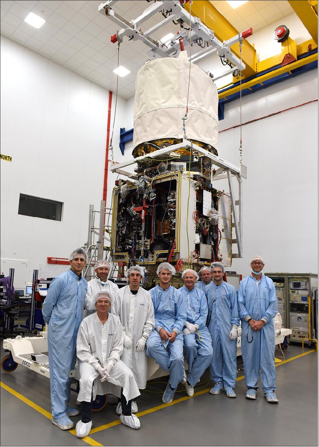 Figure 77: Standing proud: ESA’s Aeolus satellite in the cleanroom at Airbus Defence and Space in Stevenage, UK. During the last half of 2016 the UK team with support of their colleagues from Toulouse in France worked tirelessly to integrate the ALADIN instrument into the satellite, to check that all is aligned and that the complete satellite is working flawlessly. As the sole measuring instrument on the Aeolus satellite, ALADIN comprises two powerful lasers, a large telescope and very sensitive receivers. It is designed to probe the lowermost 30 km of the atmosphere to provide profiles of wind, aerosols and clouds along the satellite’s orbital path (image credit: Airbus DS)
