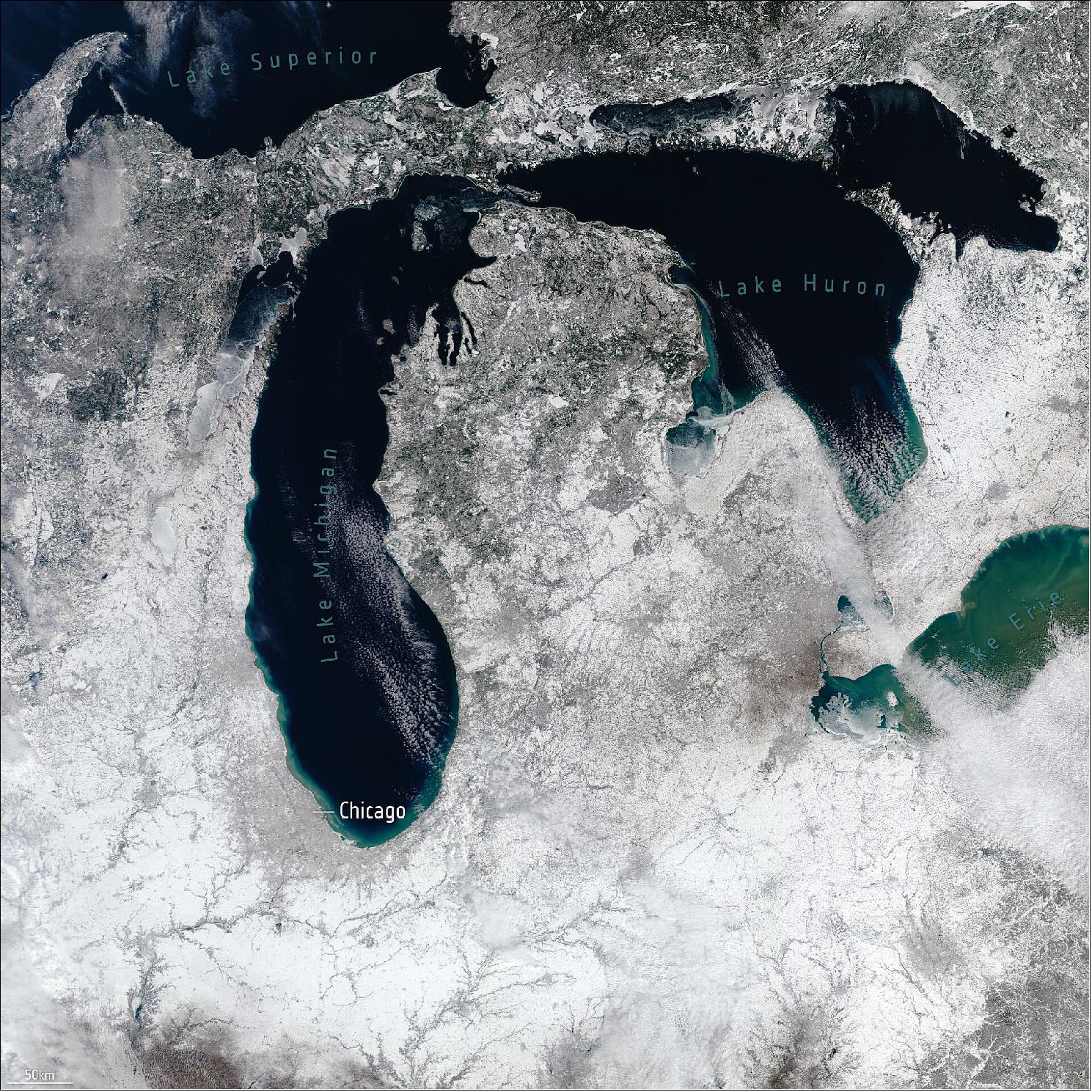 Figure 19: This image of snow in the Great Lakes region in the US was captured by the Copernicus Sentinel-3 mission's ocean and land color instrument on 3 February 2021. While there are reports of record-low ice cover on the lakes this year, there has, nevertheless, been heavy snowfall across the Midwest and Great Lakes over the last few days. Snow has also hit the northeast US. It is thought that this winter's polar vortex is currently sending extreme icy blasts of Arctic weather to some parts of the northern hemisphere. Scientists are using wind information from ESA's Aeolus satellite to shed more light on the complex polar vortex phenomenon (image credit: ESA, the image contains modified Copernicus Sentinel data (2021), processed by ESA, CC BY-SA 3.0 IGO)