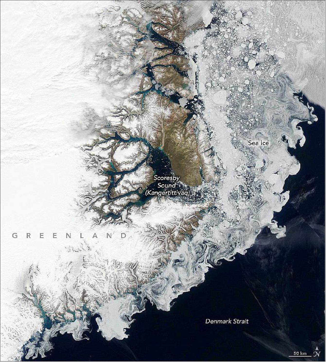 Figure 66: That's the origin of the sea ice pictured here. When satellites acquired these images in July 2020, the ice had drifted more than 1,000 km (600 miles) from the Arctic Ocean. The wide view above, acquired on July 2 with the Moderate Resolution Imaging Spectroradiometer (MODIS) on NASA's Aqua satellite, shows sea ice hugging the coast of East Greenland (image credit: NASA Earth Observatory images by Lauren Dauphin, using MODIS data from NASA EOSDIS/LANCE and GIBS/Worldview and Landsat data from USGS, story by Kathryn Hansen)