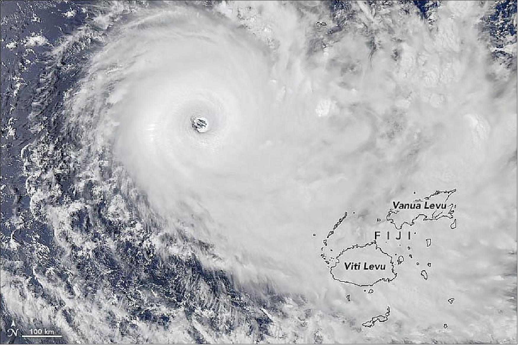 Figure 52: As of midnight Fiji standard time on December 17, the Joint Typhoon Warning Center reported sustained winds of 140 knots (260 kilometers/160 miles per hour). The center of the category 5 storm was about 400 km (240 miles) northwest of Suva, Fiji. The storm’s eye appeared to be headed between the islands of Viti Levu and Vanua Levu. Forecasters noted that wave heights around the eye of the storm could approach 14 meters (45 feet). The natural-color image above was acquired in the early afternoon on December 16, 2020, by the MODIS instrument on NASA’s Aqua satellite (image credit: NASA Earth Observatory images by Joshua Stevens, using MODIS data from NASA EOSDIS/LANCE and GIBS/Worldview and sea surface temperature data from the Multiscale Ultrahigh Resolution (MUR) project. Story by Michael Carlowicz)