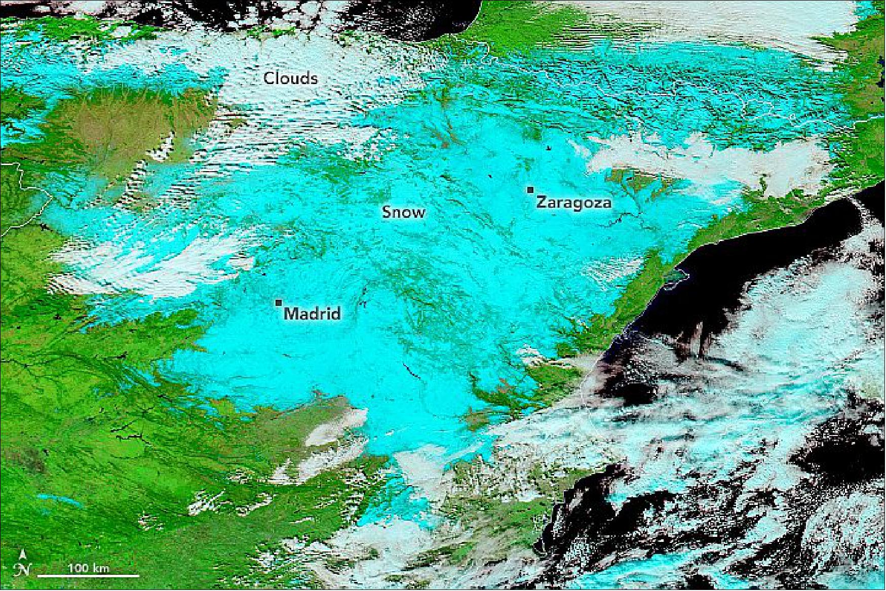 Figure 49: This MODIS image combines visible light, near-infrared, and shortwave infrared (MODIS bands 7-2-1) to distinguish clouds (white) from snow, ice, and high-altitude icy clouds (all shades of teal), image credit: NASA Earth Observatory