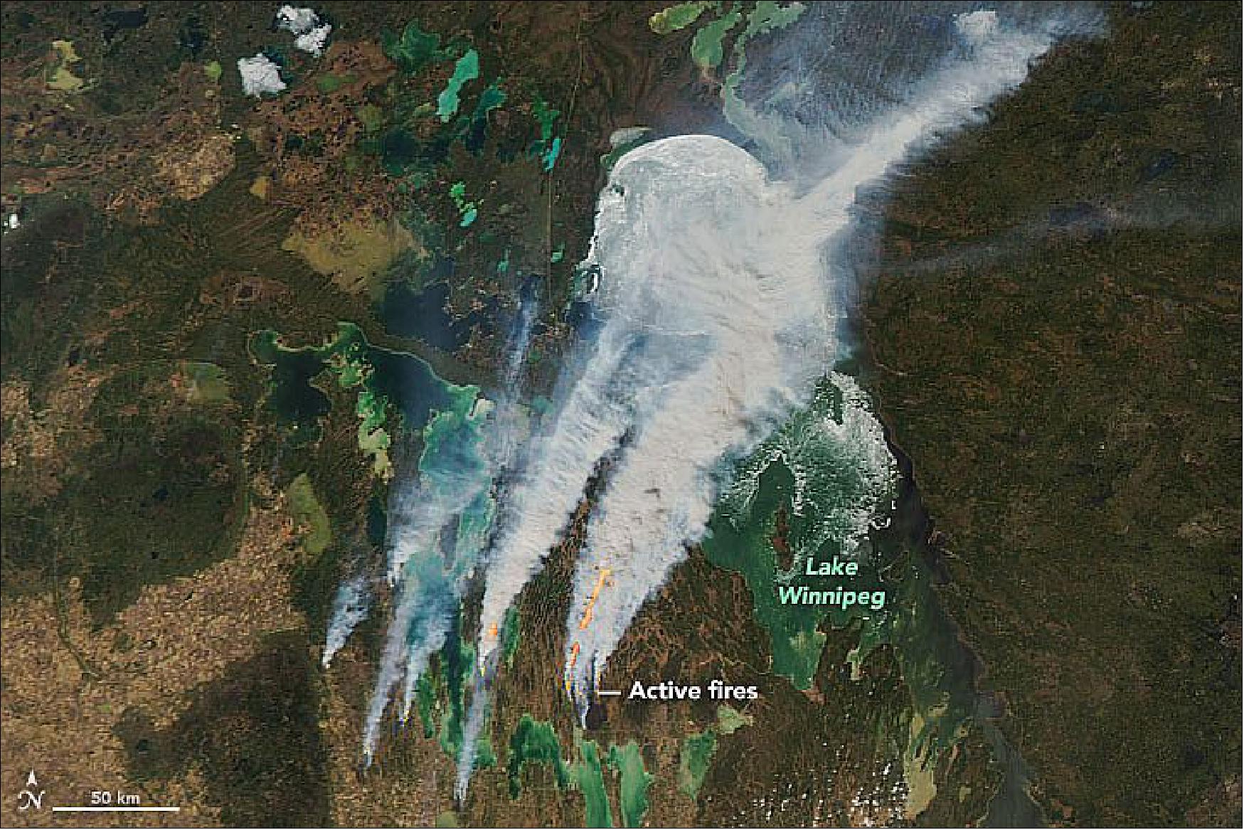 Figure 38: Canada’s Manitoba Province jumped right from winter ice to summer fires. On 18 May 2021, The MODIS instrument on NASA’s Aqua satellite acquired this natural-color image of smoke billowing from several intense wildfires west and southwest of Lake Winnipeg. Strong westerly winds drove the plumes across Hudson Bay and the Canadian interior as far as Quebec. Other fires (not shown) burned to the west in Saskatchewan and to the east in Ontario. Researchers examining NOAA GOES satellite images detected hints of pyrocumulus “fire cloud” formation south of Lake Winnipeg (image credit: NASA Earth Observatory image by Joshua Stevens, using MODIS data from NASA EOSDIS LANCE and GIBS/Worldview. Text by Michael Carlowicz)