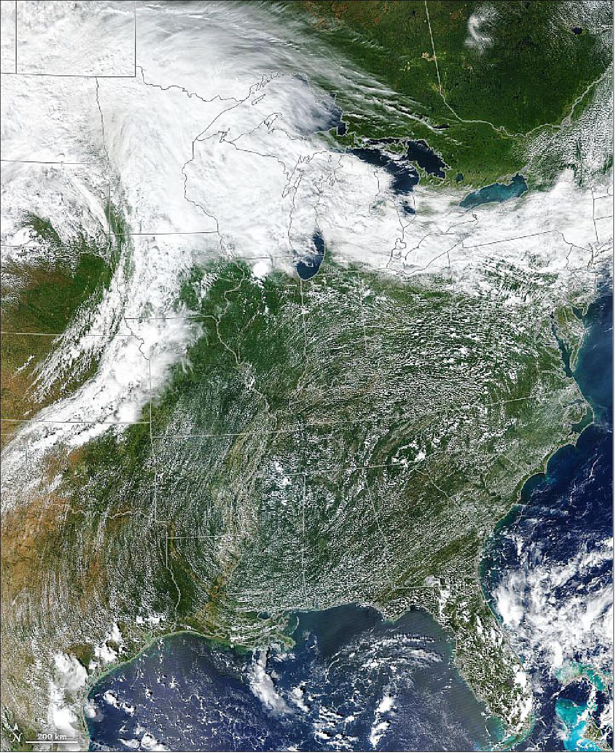 Figure 89: This image is a mosaic based on data collected by the Moderate Resolution Imaging Spectroradiometer (MODIS) on NASA's Aqua satellite and the Visible Infrared Imaging Radiometer Suite (VIIRS) on Suomi NPP on September 12, 2019. In the Southeast, thin rows of cumulus clouds trace the location of the high, with the center of circulation near Mississippi. High pressure systems typically have cool, descending air flow in their centers and winds that move in a clockwise direction in the Northern Hemisphere (image credit: NASA Earth Observatory, images by Joshua Stevens, using GOES-16 data from the NOAA-NASA GOES-R Mission, and MODIS and VIIRS data from NASA EOSDIS/LANCE and GIBS/Worldview and the Suomi National Polar-orbiting Partnership. Story by Adam Voiland)