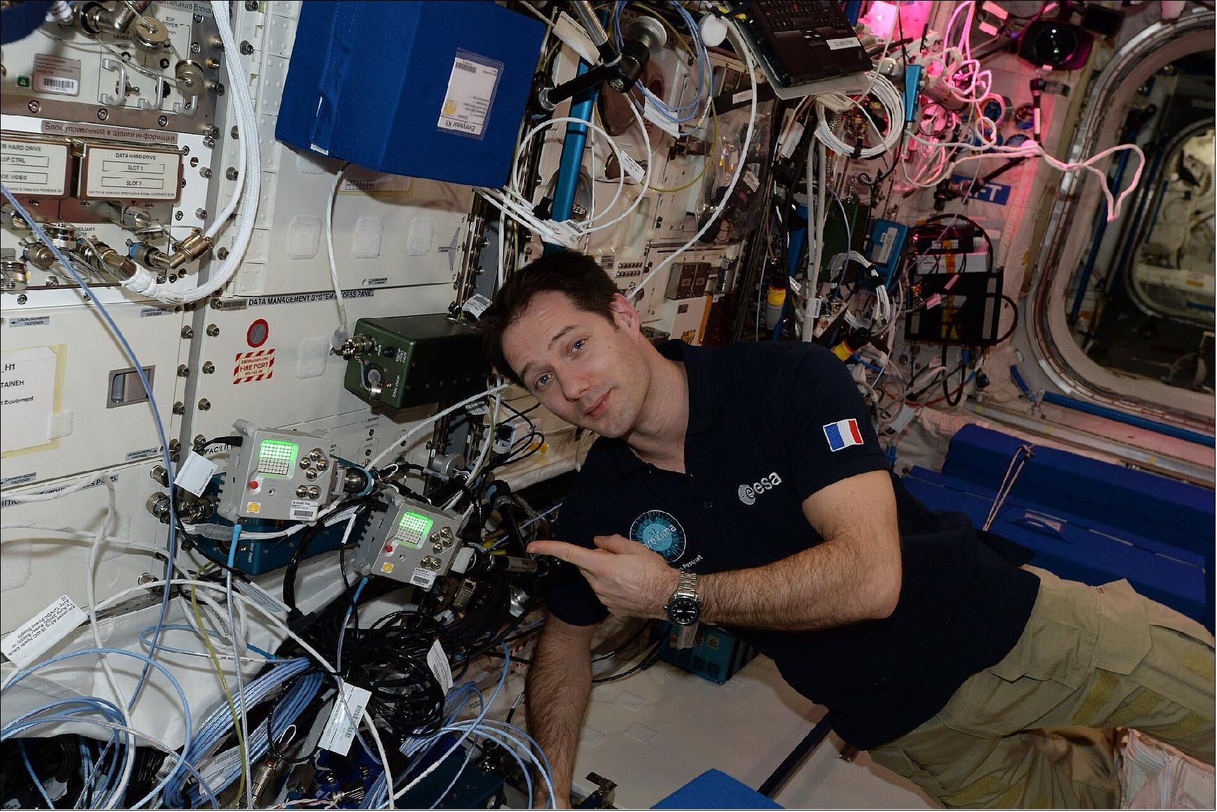 Figure 12: ESA Astronaut Thomas Pesquet with the Astro Pi computers onboard the ISS (image credit: ESA/NASA)