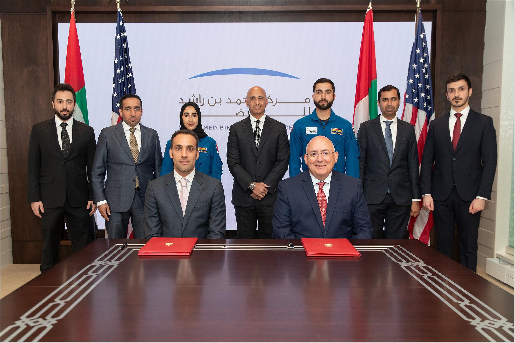 Figure 11: Axiom Space and the Mohammed bin Rashid Space Center (MBRSC) signed an agreement for a United Arab Emirates (UAE) astronaut to fly on the International Space Station in 2023. The agreement was signed at the Embassy of the United Arab Emirates in Washington, D.C. on April 27 by Salem Humaid AlMarri, Director-General of MBRSC and Michael Suffredini, President and CEO of Axiom Space (image credit: MBRSC)