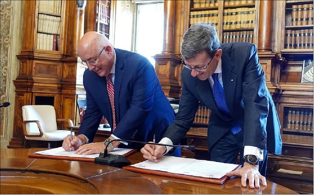 Figure 10: The President and CEO of Axiom Space, Michael Suffredini (left), and Italy’s Minister for Technological Innovation and Digital Transition, Vittorio Colao, (right) sign a MOU in Rome. The agreement furthers the Italian government's and Axiom Space's existing collaboration, including the potential for the development of space infrastructure integrated with the future Axiom Station, the world's first commercial space station (image credit: Axiom)