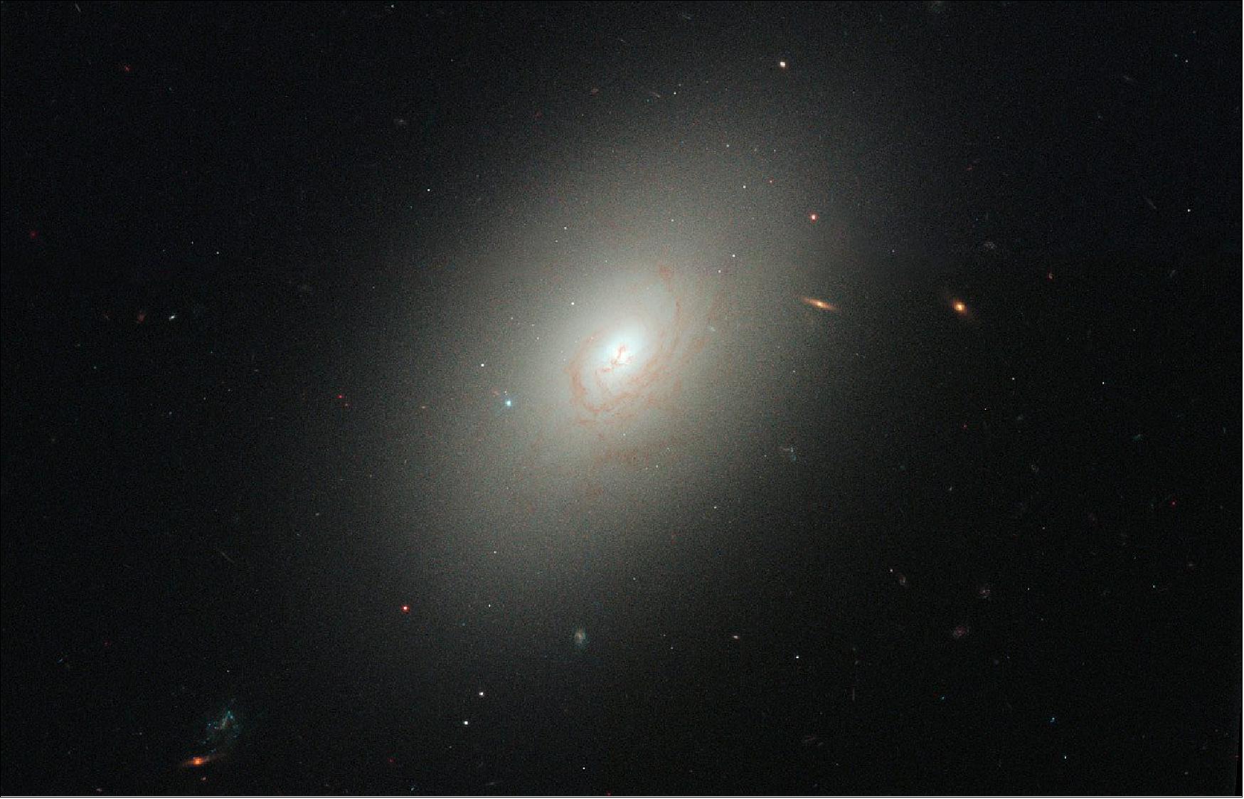 Figure 28: An image of the quiescent elliptical galaxy NGC 4150, made with the Hubble Space Telescope. Star formation in this system has essentially shut down [image credit: NASA, ESA, R. M. Crockett (University of Oxford), S. Kaviraj (Imperial College London & University of Oxford), J. Silk (University of Oxford), M. Mutchler (STScI, Baltimore), R. O'Connell (University of Virginia, Charlottesville), WFC3 SOC, Licence type Attribution (CC BY 4.0)]