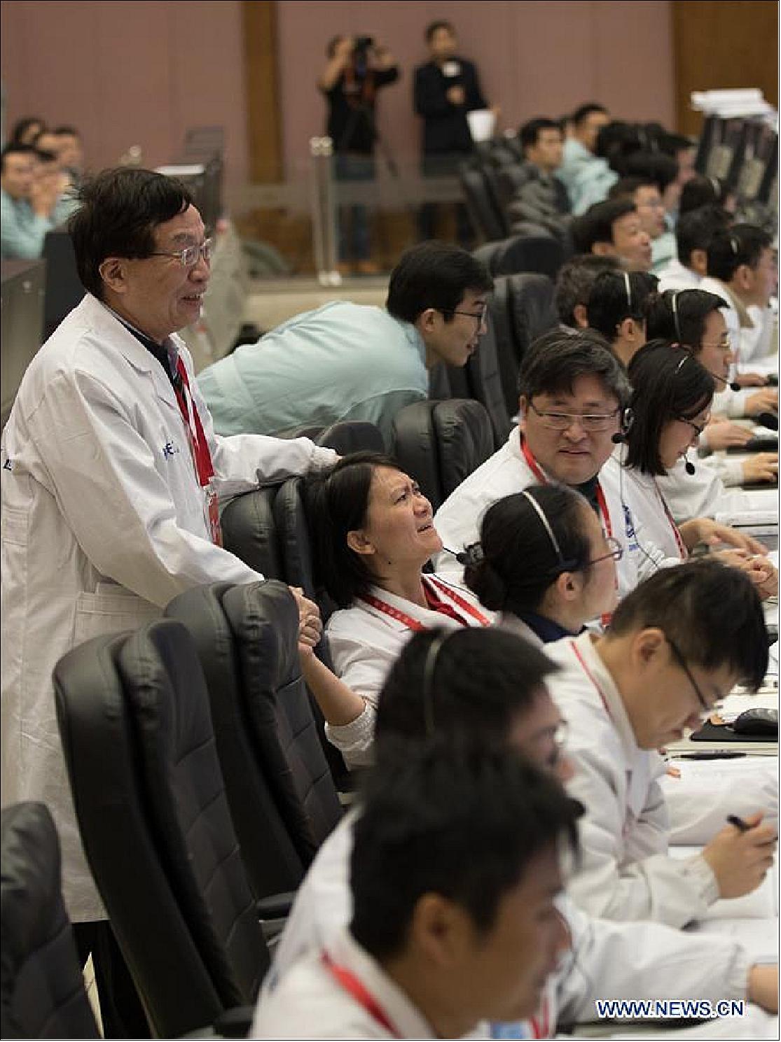 Figure 31: Technicians celebrate after the landing of the Chang'e-4 lunar probe, at the Beijing Aerospace Control Center (BACC) in Beijing, China on 3 January 2019 (image credit: Xinhua)