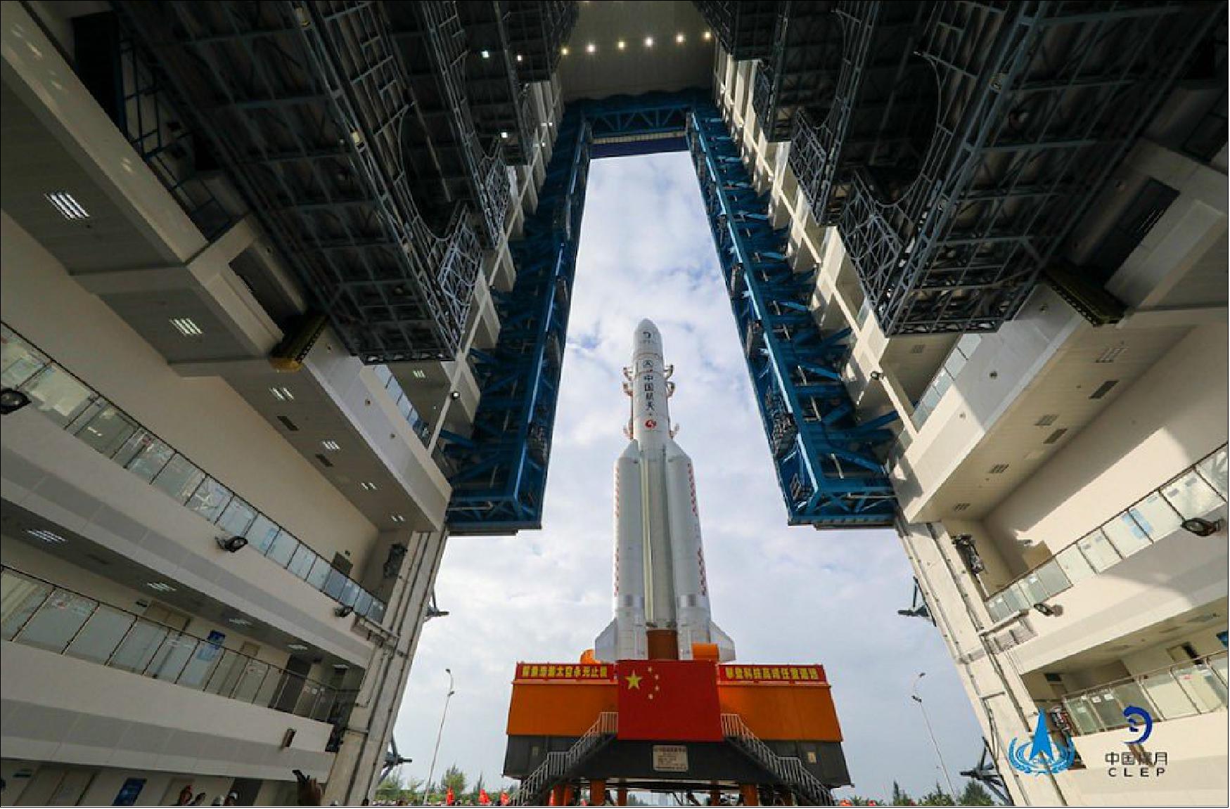 Figure 9: A Chinese Long March 5 rocket rolls out of its assembly building at the Wenchang launch base Nov. 17 with the Chang’e-5 spacecraft (image credit: CASC/CLEP) 8)