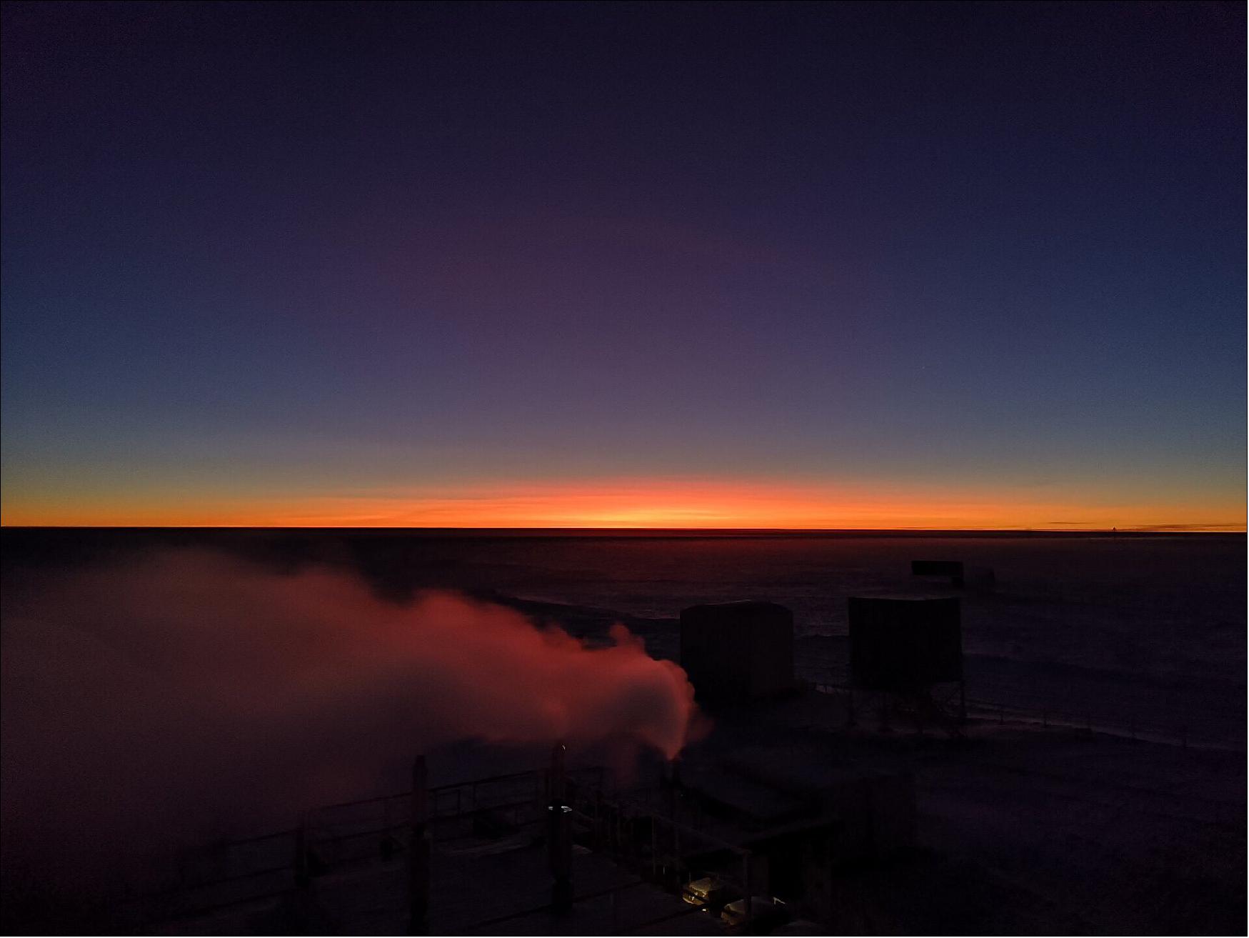 Figure 7: The 12-member crew at Concordia, located at the mountain plateau called Dome C, have spent the last few months in complete darkness: the sun disappeared in May and will not be fully visible again until mid-August. This image of high noon signals the beginning of the end of winter on the remote continent (image credit: ESA/IPEV/PNRA–N. Smith)