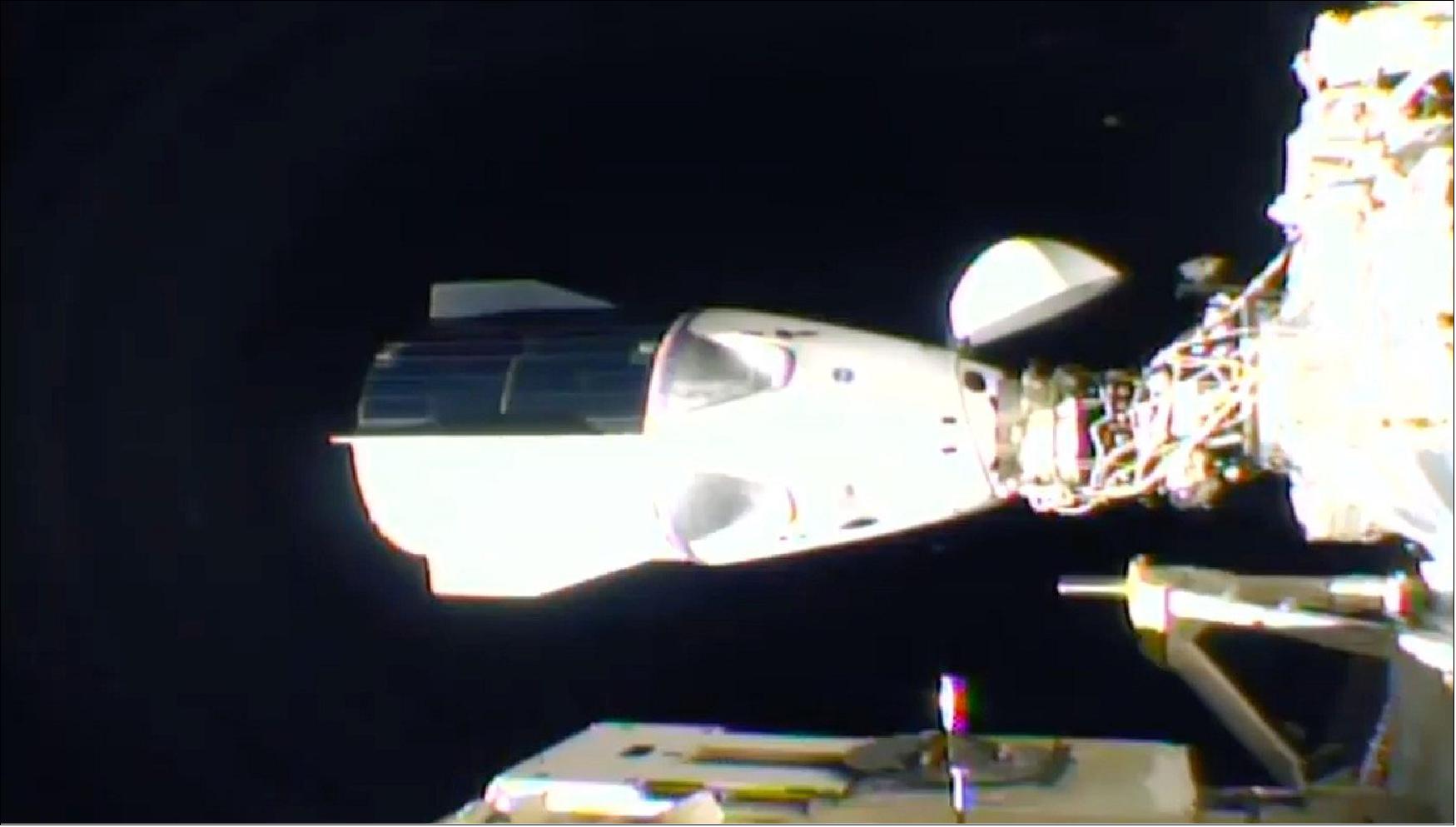 Figure 11: SpaceX’s Crew Dragon “Resilience” spacecraft docked at the International Space Station (image credit: NASA TV/Spaceflight Now) 10)