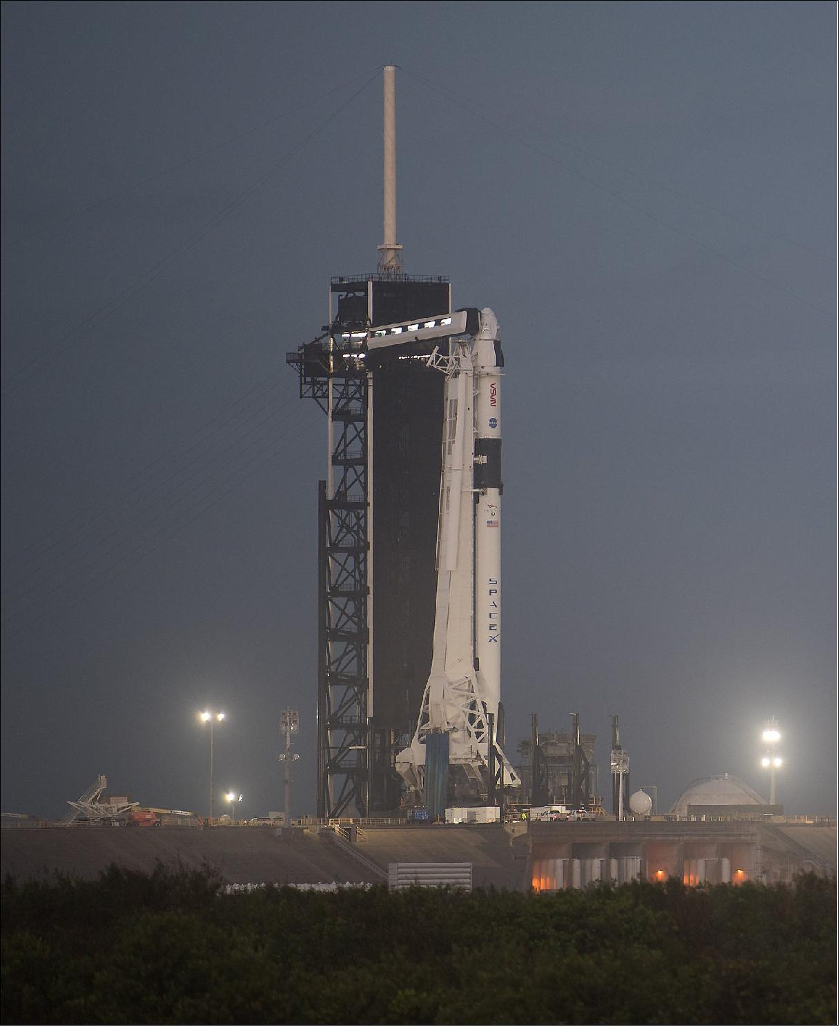 Figure 4: A SpaceX Falcon 9 rocket with the company’s Crew Dragon spacecraft stands tall on the launch pad at NASA Kennedy Space Center’s Launch Complex 39A in Florida on Tuesday, Nov. 10, after being rolled out overnight (image credit: NASA/Joel Kowsky)