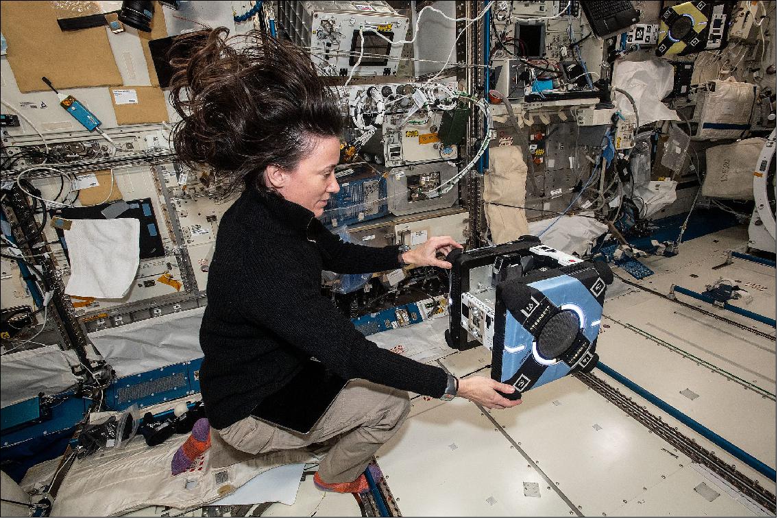 Figure 6: NASA astronaut and Expedition 65 Flight Engineer Megan McArthur sets up an Astrobee robotic free flyer inside the International Space Station's Kibo laboratory module (image credit: NASA)
