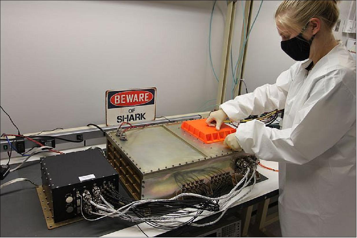 Figure 8: A Northrop Grumman engineer prepares SharkSat for integration with the Cygnus spacecraft (image credit: NG)