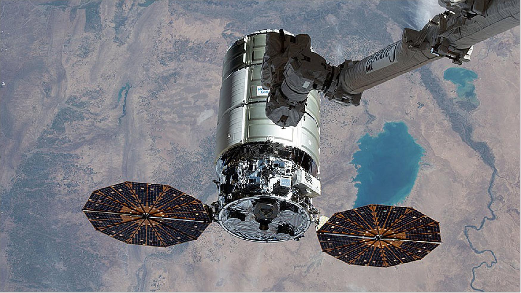 Figure 20: The Cygnus space freighter is pictured moments away from being captured with the Canadarm2 robotic arm above northern Iraq on Feb. 21, 2022 (image credit: NASA TV)