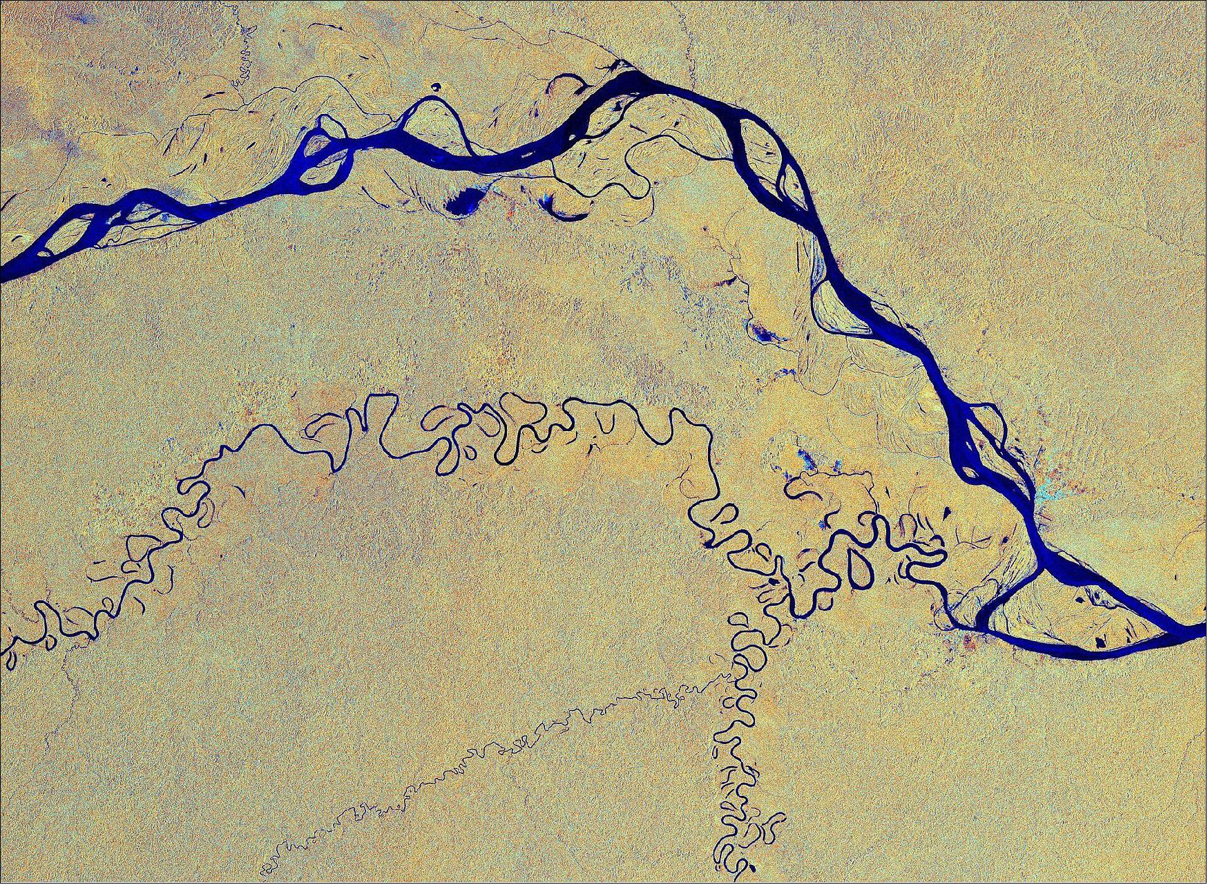 Figure 11: This Sentinel-1 image has been processed in a way that shows water bodies, such as the Amazon River, in blue. The Amazon river begins its journey in the Andes and makes its way east through six South American countries before emptying into the Atlantic Ocean on the northeast coast of Brazil. The river has a length of around 6400 km – the equivalent of the distance from New York City to Rome. This image, acquired on 3 March 2019, is also featured on the Earth from Space video program (image credit: ESA, the image contains modified Copernicus Sentinel data (2019), processed by ESA, CC BY-SA 3.0 IGO)
