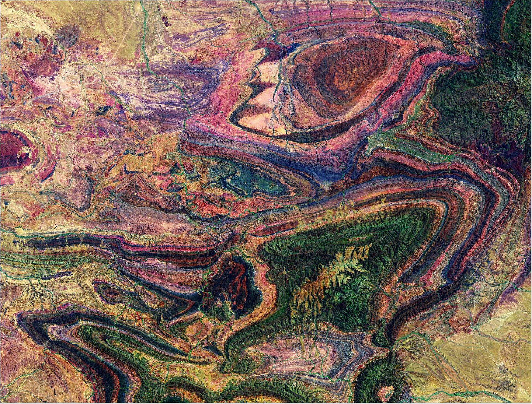 Figure 25: The many colorful curves and folds of the Flinders Ranges – the largest mountain range in South Australia – are featured in this false-color image captured by the Copernicus Sentinel-2 mission. This image, also featured on the Earth from Space video program, was captured on 31 December 2019 by the Copernicus Sentinel-2 mission – a two-satellite mission to supply the coverage and data delivery needed for Europe’s Copernicus program. The image was processed by selecting spectral bands that can be used for classifying geological features (image credit: ESA, the image contains modified Copernicus Sentinel data (2019), processed by ESA, CC BY-SA 3.0 IGO)