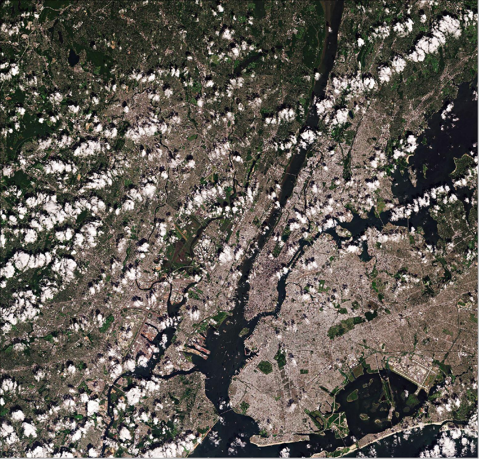 Figure 12: In this image, captured on 26 August 2019, the island of Manhattan is visible in the center, bounded by the Hudson, East and Harlem rivers. In the middle of Manhattan, Central Park can be seen as a long, green rectangle with a large lake in the middle. The Brooklyn and Queens boroughs can be seen on the right. John F. Kennedy International Airport – the busiest international air passenger gateway into North America – can easily be identifiable in the lower right of the image. The Bronx is visible north of Manhattan, while Staten Island can be seen in the lower left of the image. New Jersey dominates the upper left side of the image. This image is also featured on the Earth from Space video program (image credit: ESA, the image contains modified Copernicus Sentinel data (2019), processed by ESA, CC BY-SA 3.0 IGO)
