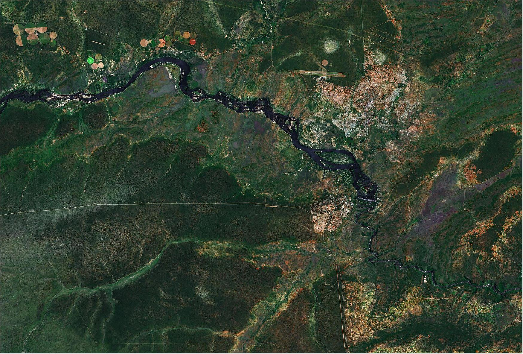 Figure 56: In this image, captured on 22 February 2019, the river cuts from left to right in the image before plunging over Victoria Falls – visible as a white line in the image. While it is neither the highest nor the widest waterfall in the world, Victoria Falls has a width of around 1700 m and a height of over 100 m which classifies it as the world’s largest sheet of falling water. This image is also featured on the Earth from Space video program (image credit: ESA, the image contains modified Copernicus Sentinel data (2019), processed by ESA)