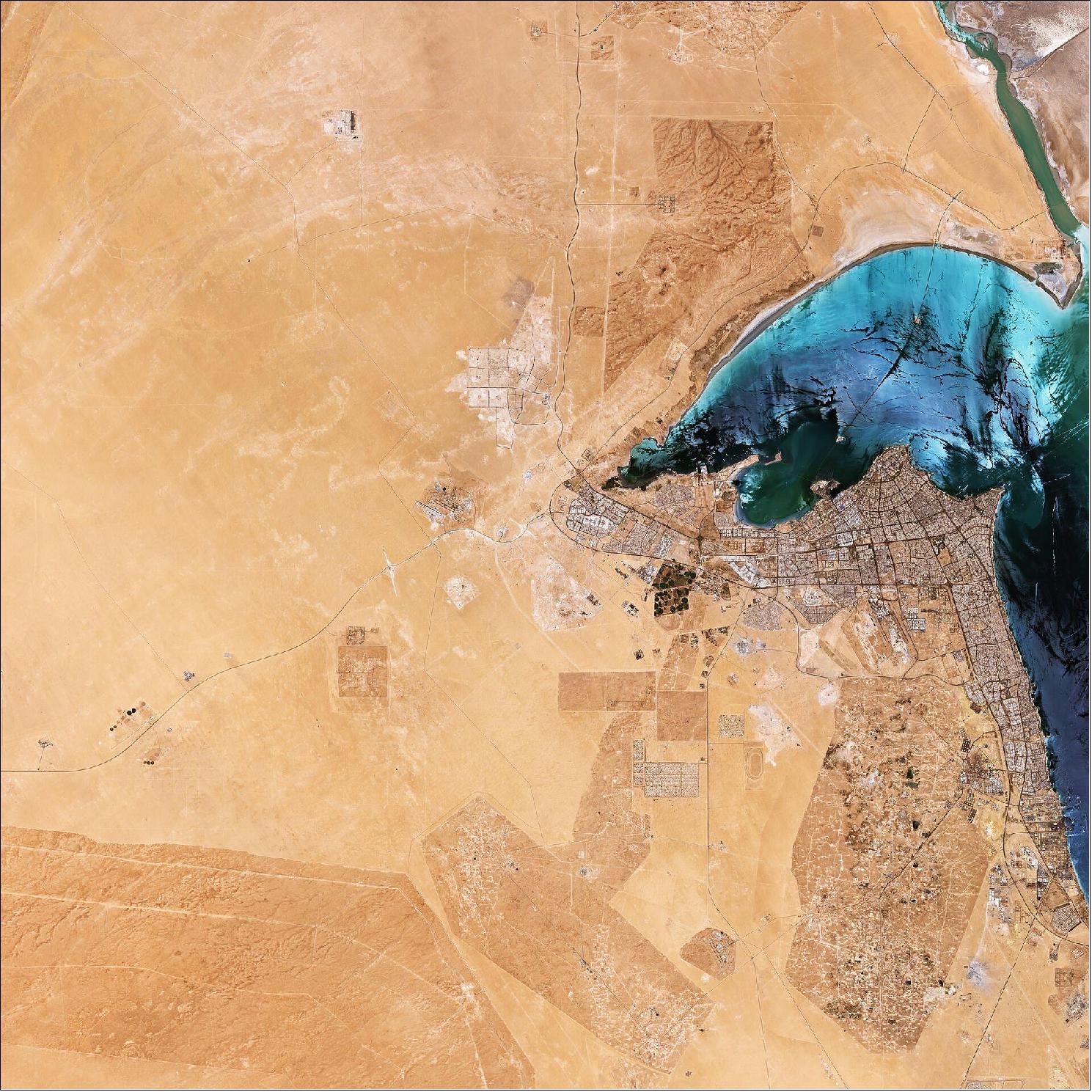 Figure 55: The flat, sandy Arabian Desert covers the majority of Kuwait and appears as a vast expanse of light sand-colored terrain in this image, captured on 25 July 2019. During the dry season, between April and September, the heat in the desert can be severe with daytime temperatures reaching 45ºC and, on occasion, over 50ºC. This image is also featured on the Earth from Space video program (image credit: ESA, the image contains modified Copernicus Sentinel data (2019), processed by ESA, CC BY-SA 3.0 IGO)