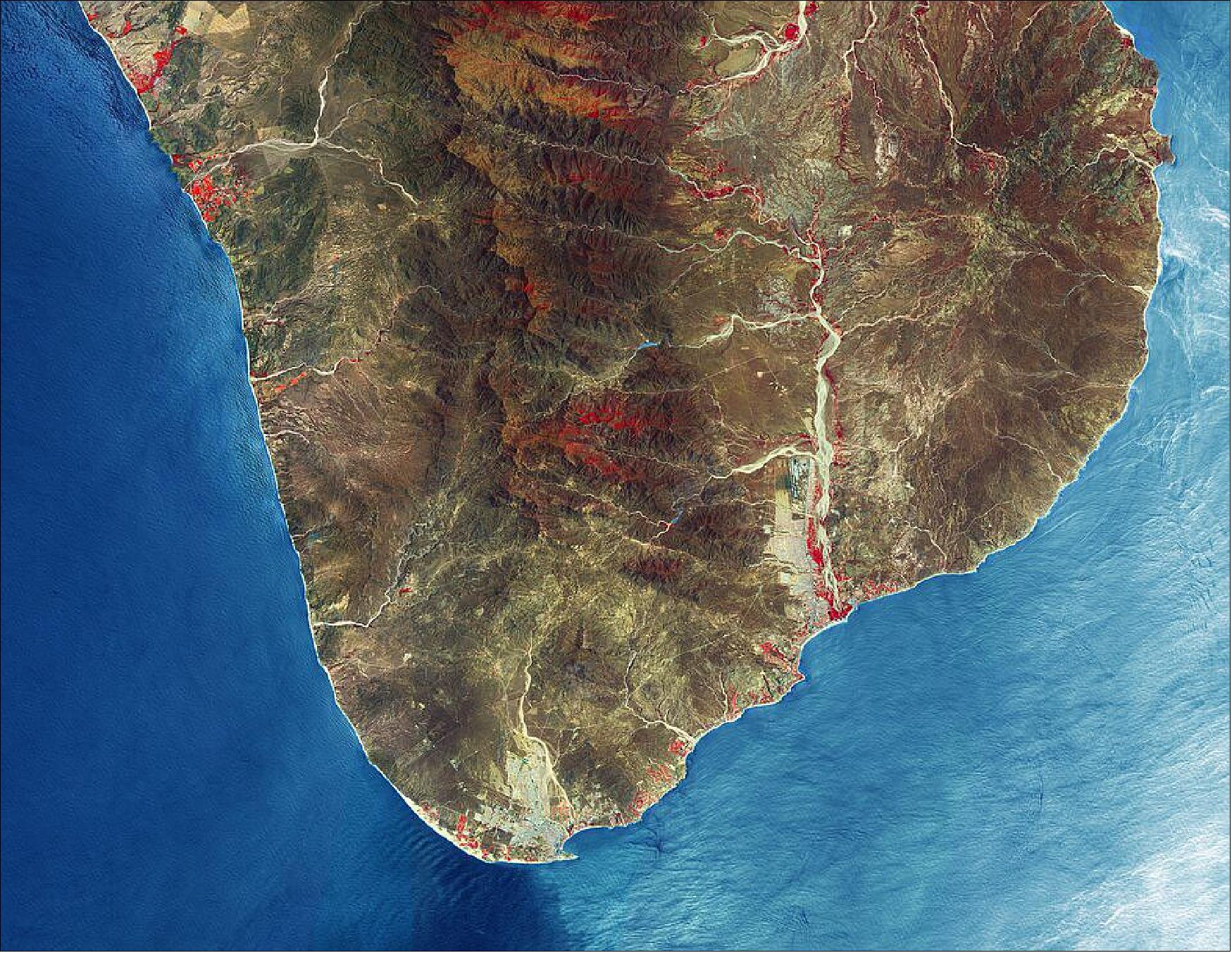 Figure 42: This image has been processed in a way that included the Copernicus Sentinel-2’s near-infrared channel, which makes vegetation appear bright red. As the image was acquired on 20 June 2020, the region is particularly dry with little vegetation visible. Los Cabos is dry and warm most of the year, with a short rainy season in late summer and early autumn. This image is also featured on the Earth from Space video program (image credit: ESA)