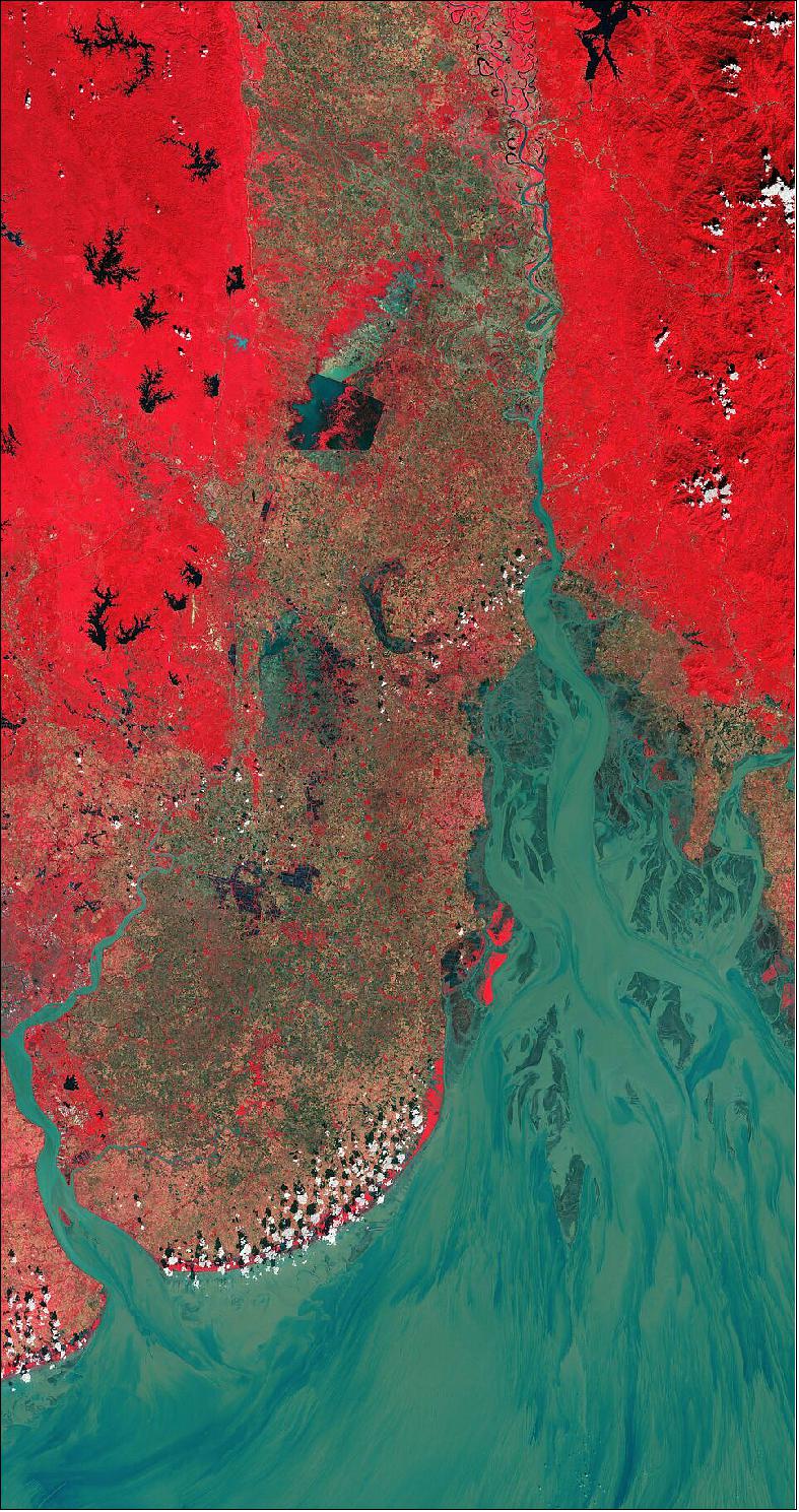 Figure 33: The Sittang River, visible in the right side of the image, originates near Mandalay, Myanmar, and flows southward for around 420 km before emptying into the gulf. Dense vegetation can be seen in bright red, particularly in the left of the image. The distinct rectangular shape, visible in the upper half of the image, is part of the Moeyungyi Wetland Wildlife Sanctuary, a designated Ramsar Site of International Importance. The site encompasses several artificial lakes and bodies (visible in black). One of the bodies of water appears in light blue most likely owing to eutrophication – the overabundance of algae, phosphorus and other plant nutrients. This image, acquired on 18 November 2020, is also featured in the Earth from Space video program