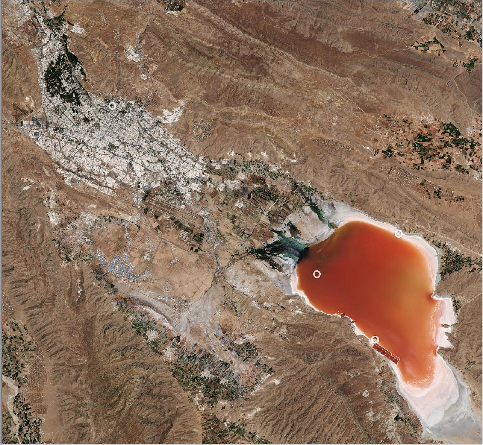 Figure 21: Given the lake is seasonal, water levels will drop in the summer and rise again in the winter. In this image, captured in June 2019, the lake appears dark orange which means that the lake is very shallow but still contains some water. In comparison, Maharloo was completely dry in June 2021. This image is also featured on the Earth from Space video program (image credit: ESA)