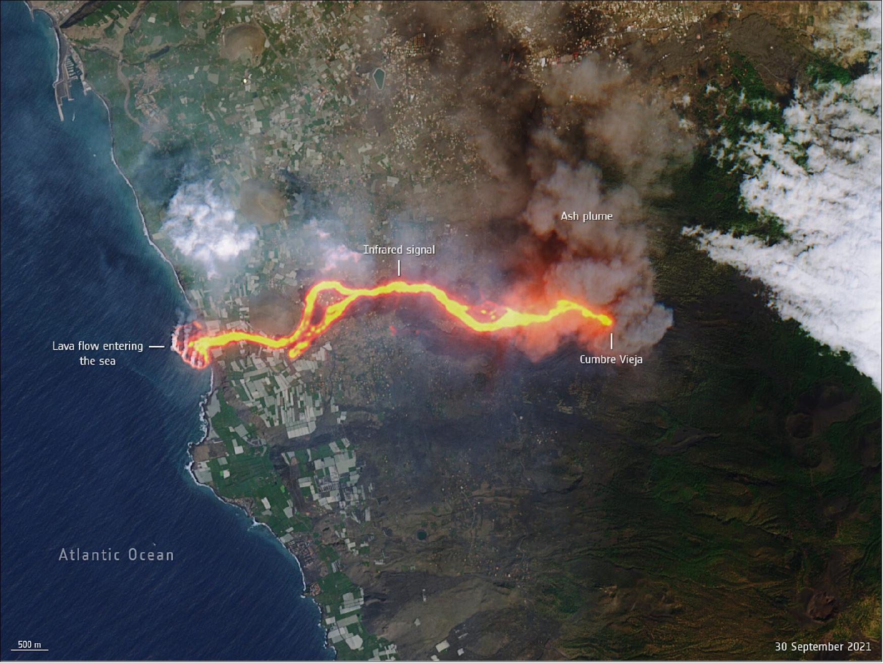 Figure 18: This image, captured by the Copernicus Sentinel-2 mission on 30 September, shows the flow of lava from the volcano erupting on the Spanish island of La Palma. The cascade of lava can be seen spilling into the Atlantic Ocean, extending the size of the coastline. This ‘lava delta’ covered about 20 hectares when the image was taken (image credit: ESA, the image contains modified Copernicus Sentinel data (2021), processed by ESA, CC BY-SA 3.0 IGO)