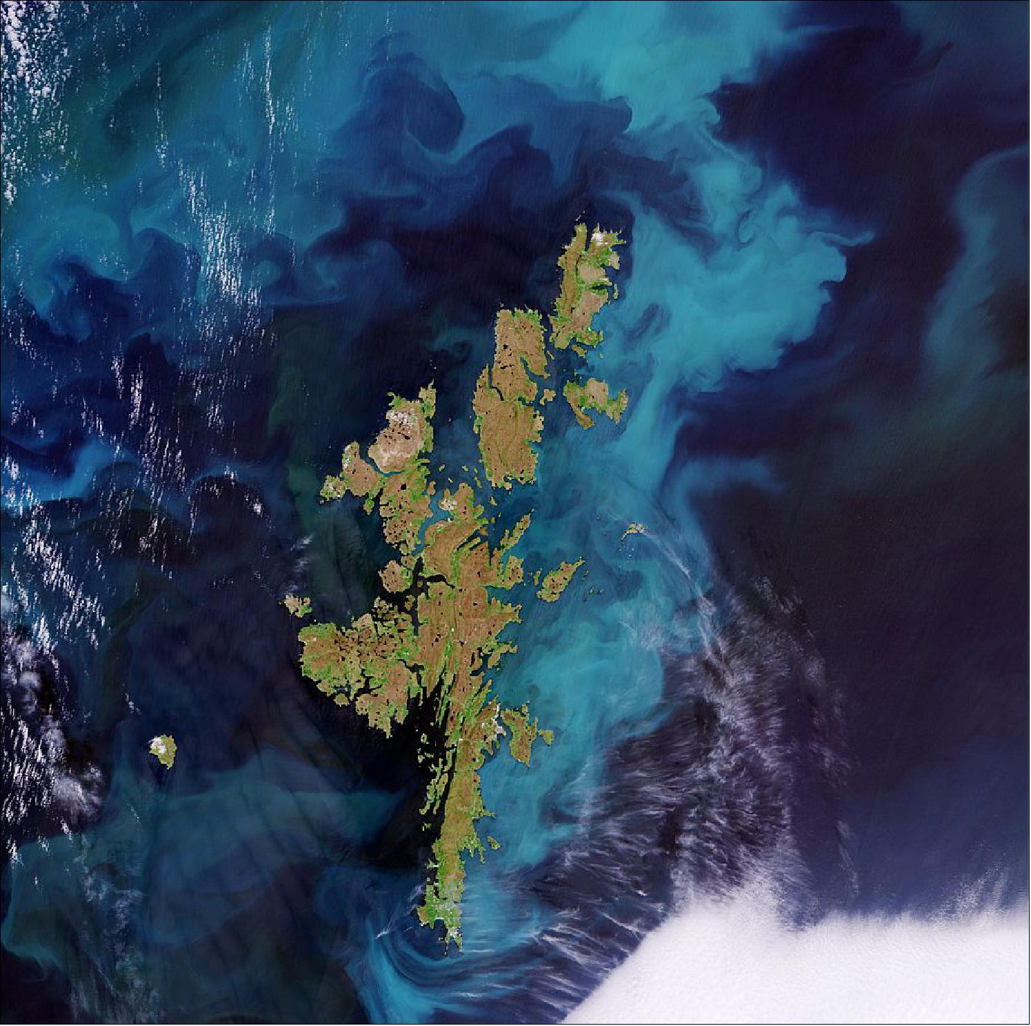 Figure 10: The Shetland Islands, an archipelago in the Northern Isles of Scotland, are featured in this Copernicus Sentinel-2 image. The most striking feature in this week’s image, captured on 1 July 2021, is the vivid, turquoise-colored bloom visible to the east of the islands. This type of bloom is slightly different to the harmful cyanobacteria often visible around the Baltic Sea. This image of the Shetland Islands is also featured in this week's edition of the Earth from Space video program (video credit: ESA)