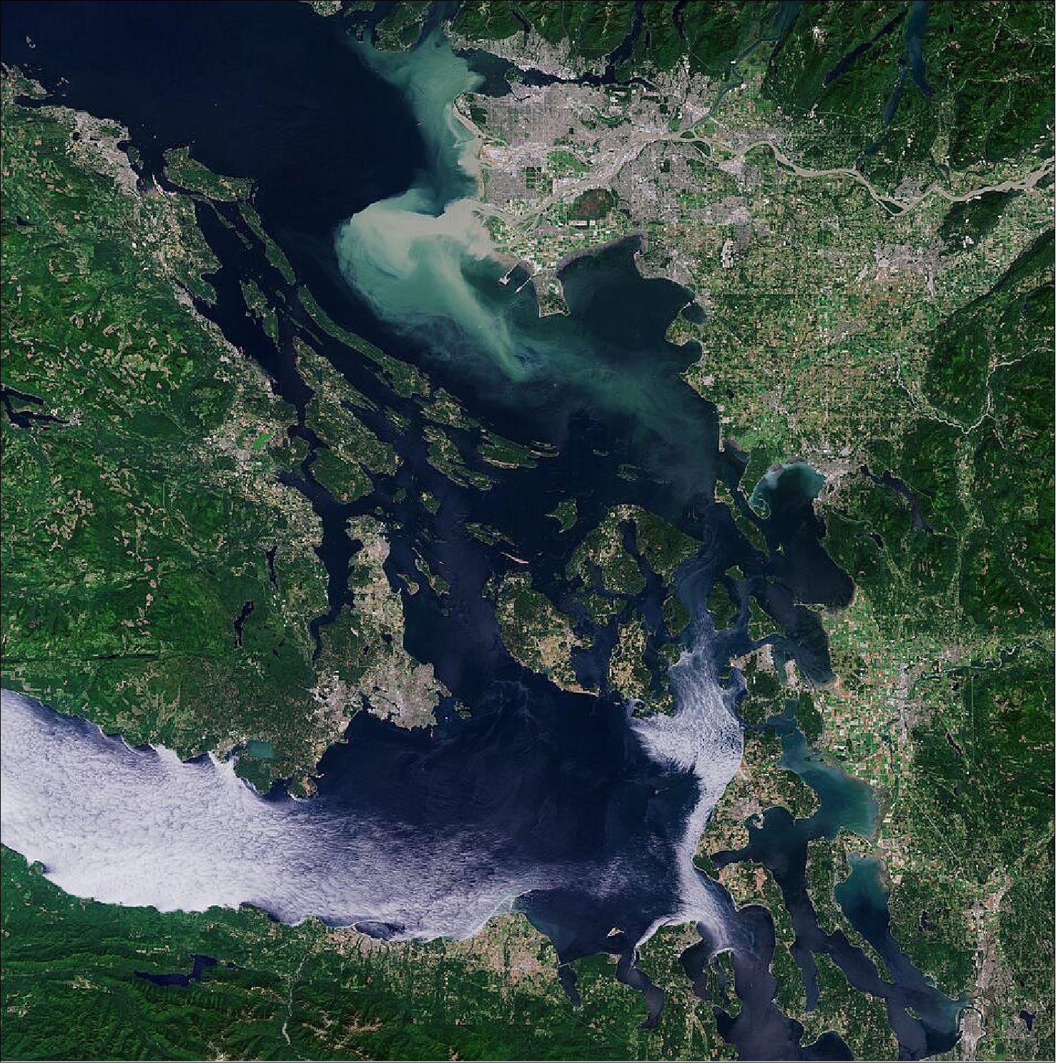Figure 69: Vancouver, visible at the top of the image, lies between the Burrard Inlet, an arm of the Strait of Georgia, to the north, and the Fraser River delta to the south. Vancouver has the highest population density in Canada, with over 5400 people/km2, making it the fifth-most densely populated city in North America. This image is also featured on the Earth from Space video program (image credit: ESA, the image contains modified Copernicus Sentinel data (2019), processed by ESA, CC BY-SA 3.0 IGO)
