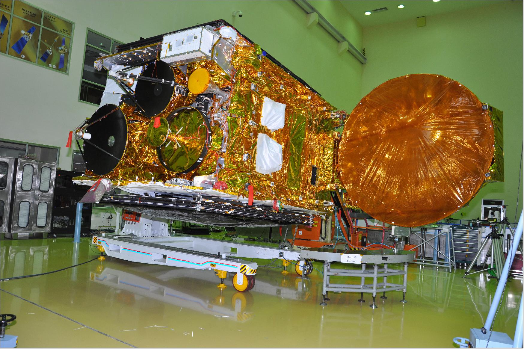 Figure 7: Photo of the GSAT-17 satellite in clean room with one of its antennas deployed (image credit: ISRO) 9)