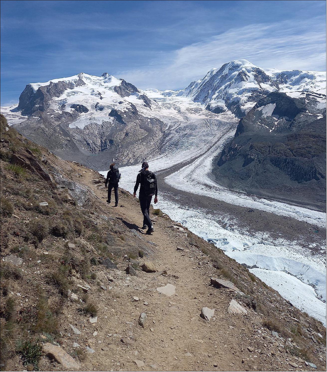 Figure 1: In August 2021 ESA astronaut, Luca Parmitano, and the head of the ESA Climate Office, Susanne Mecklenburg, joined a science expedition taking place at one of the biggest ice masses in the Alps: the Gorner Glacier (image credit: ESA)